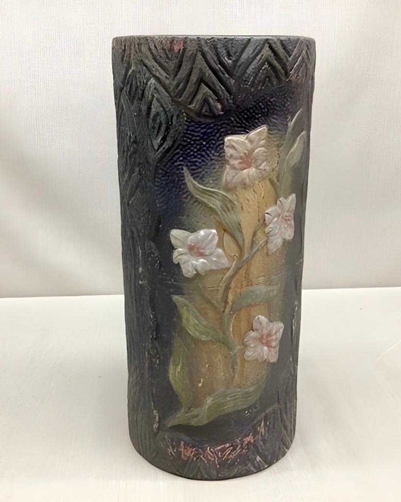 Antique Arts & Crafts 19 5/8” Raised Flower Pattern over a faux bois motif Terra Cotta Umbrella Stand. Hand painted. Early 20th Century. Has a really nice weight to it. Pictures don’t do this fantastic piece justice.
