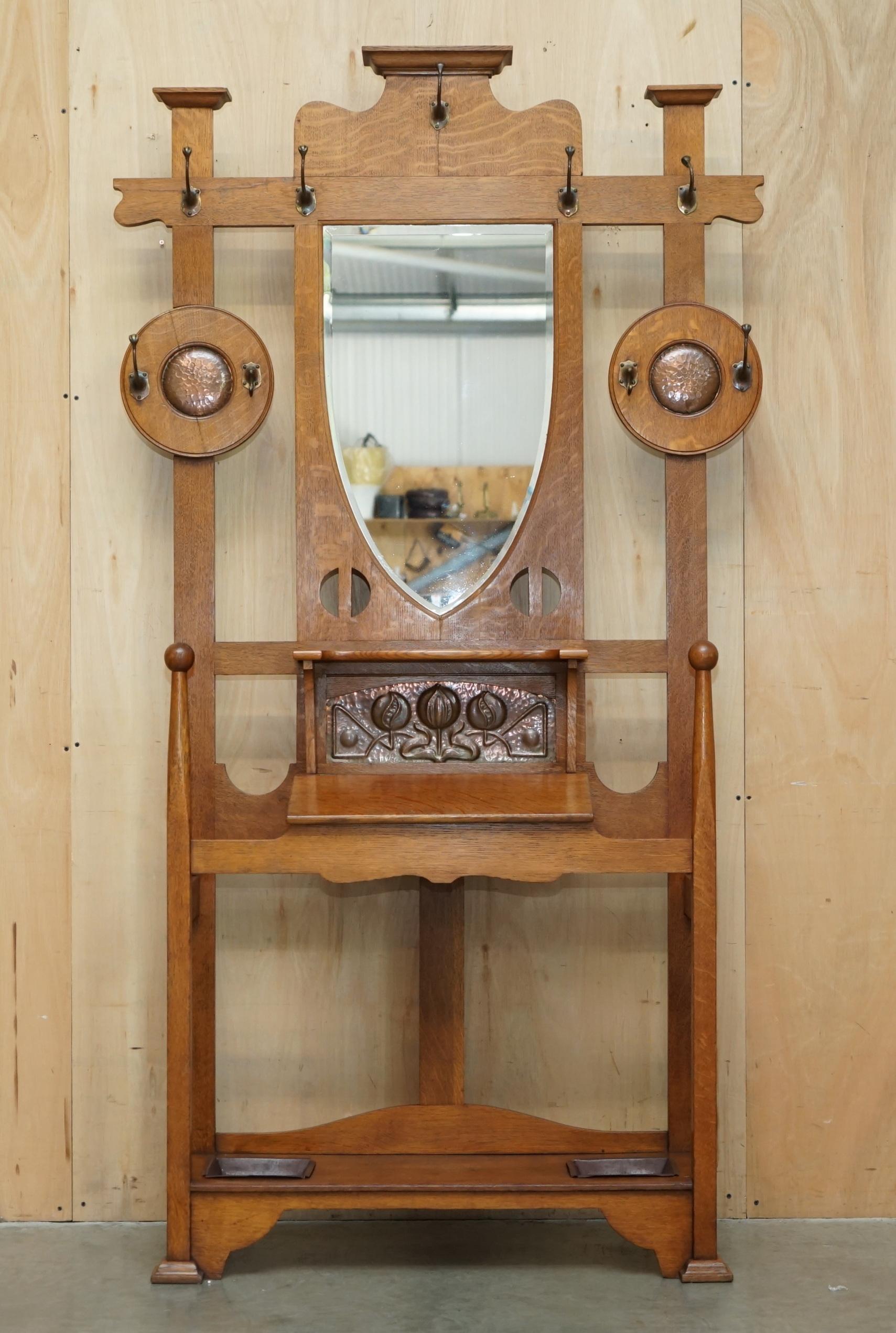 Royal House Antiques

Royal House Antiques is delighted to offer for sale this stunning original Arts & Crafts Shapland & Petter Hall stand with hand hammered Copper panels over a Walnut frame with inset sheild mirror

Please note the delivery fee