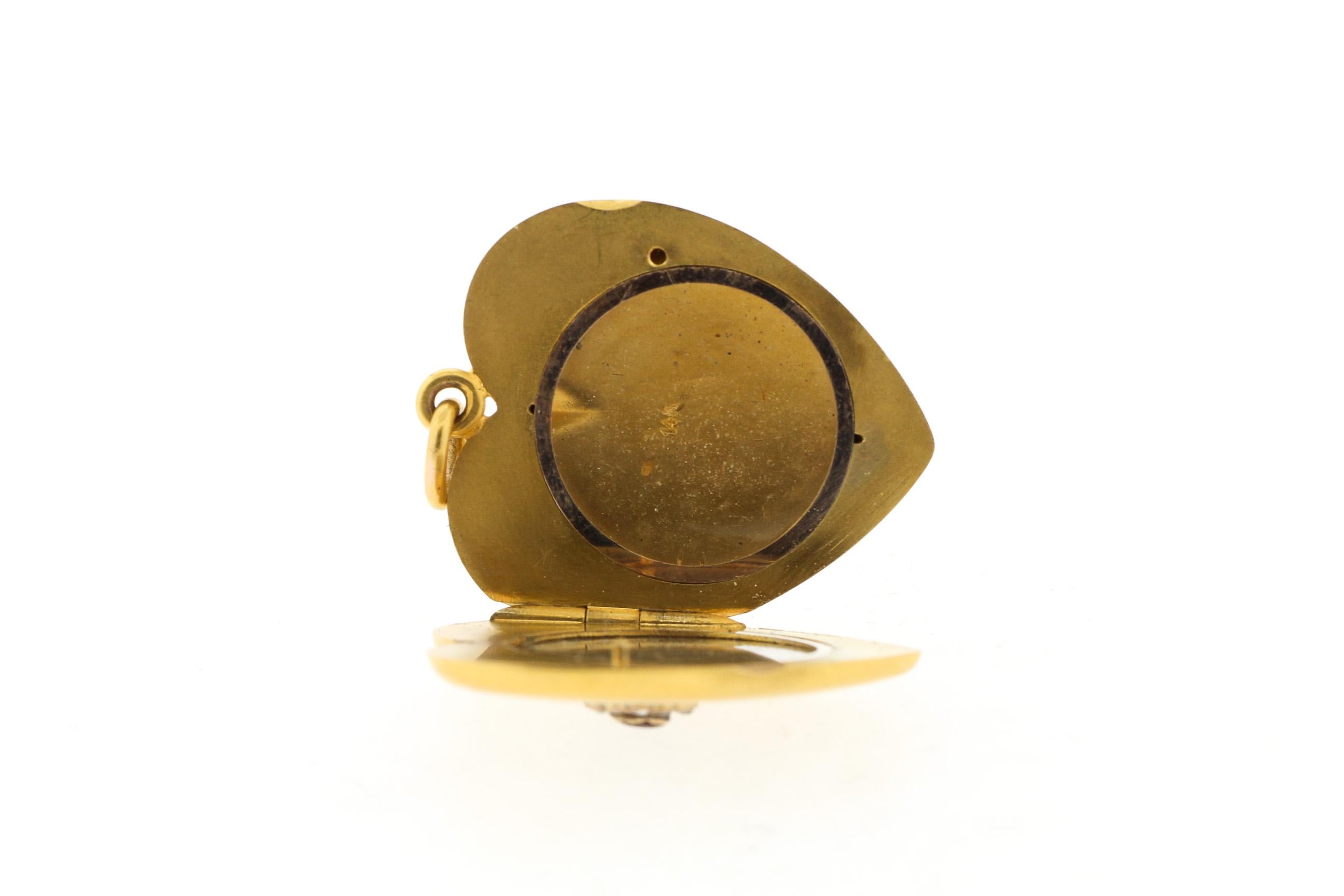 Women's or Men's Antique 1900s 14 Karat Yellow Gold Ruby Diamond Heart Locket
