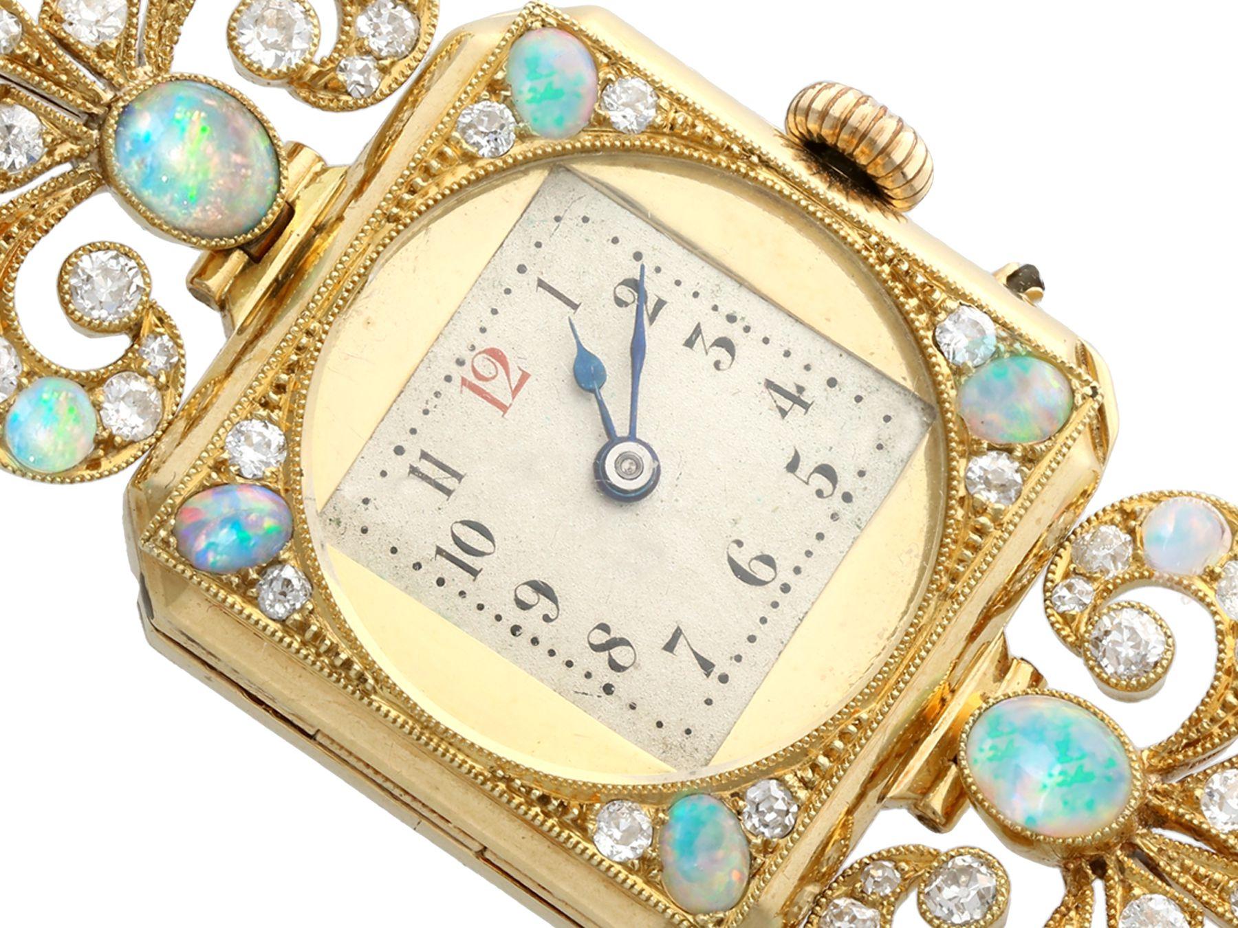 A stunning, fine and impressive antique Edwardian 2.12 Carat opal and 1.09 Carat diamond, 18 karat yellow gold cocktail watch; part of our diverse vintage jewelry collections

This stunning, fine and impressive antique Edwardian watch has been