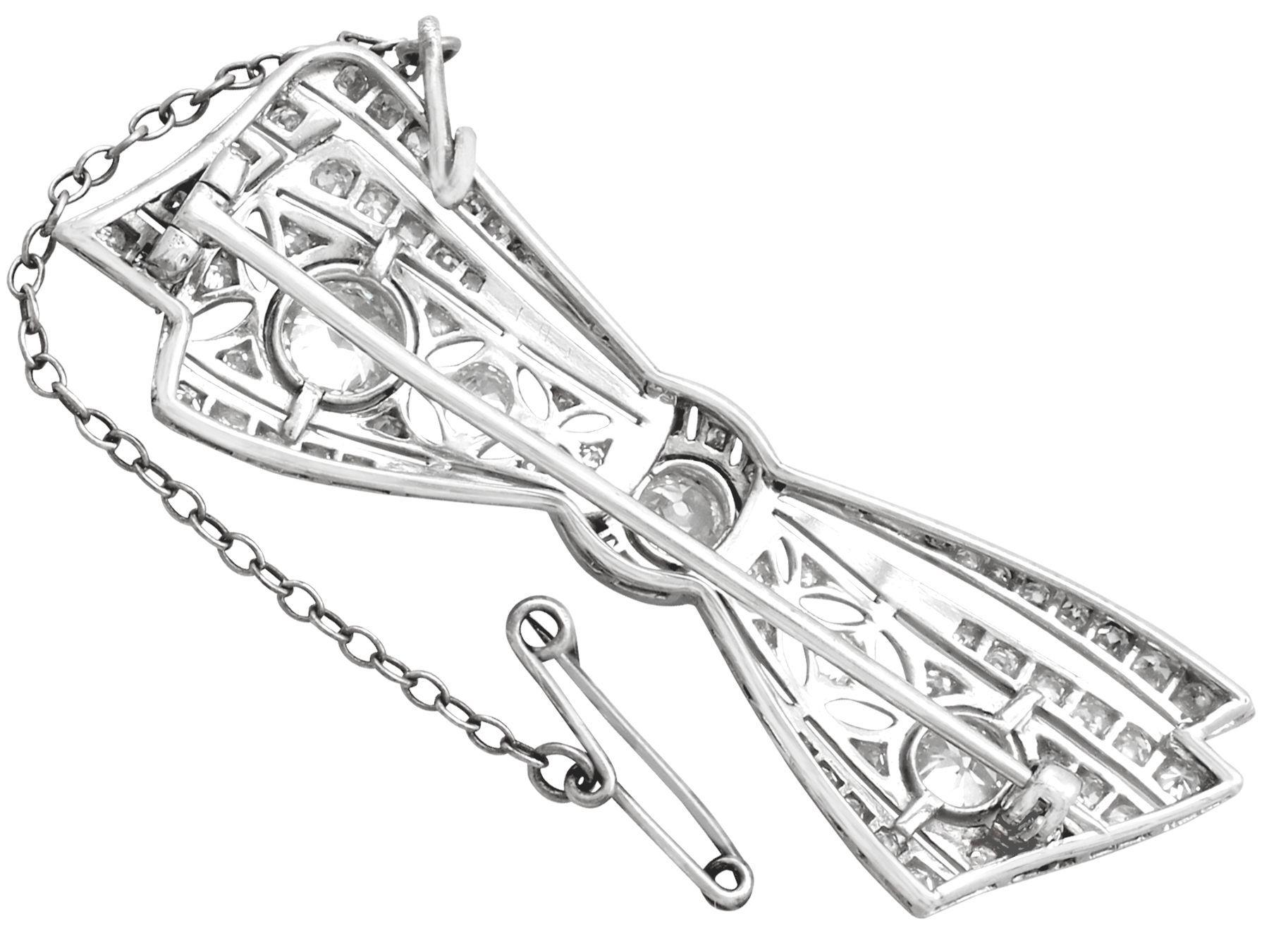 Women's Antique 1900s 2.55 Carat Diamond White Gold Bow Brooch For Sale