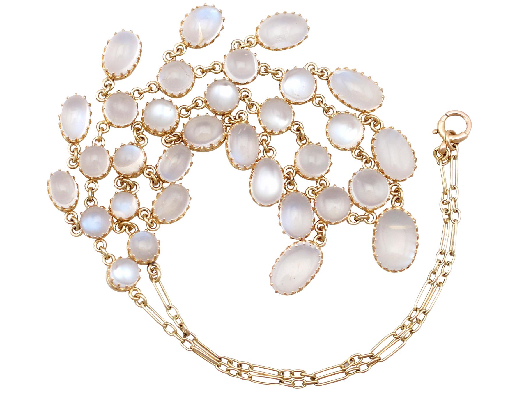An impressive antique 1900s 42.20 carat moonstone and 9 karat yellow gold necklace; part of our diverse antique estate jewelry collections.

This fine and impressive antique moonstone necklace has been crafted in 9k yellow gold.

The necklace is
