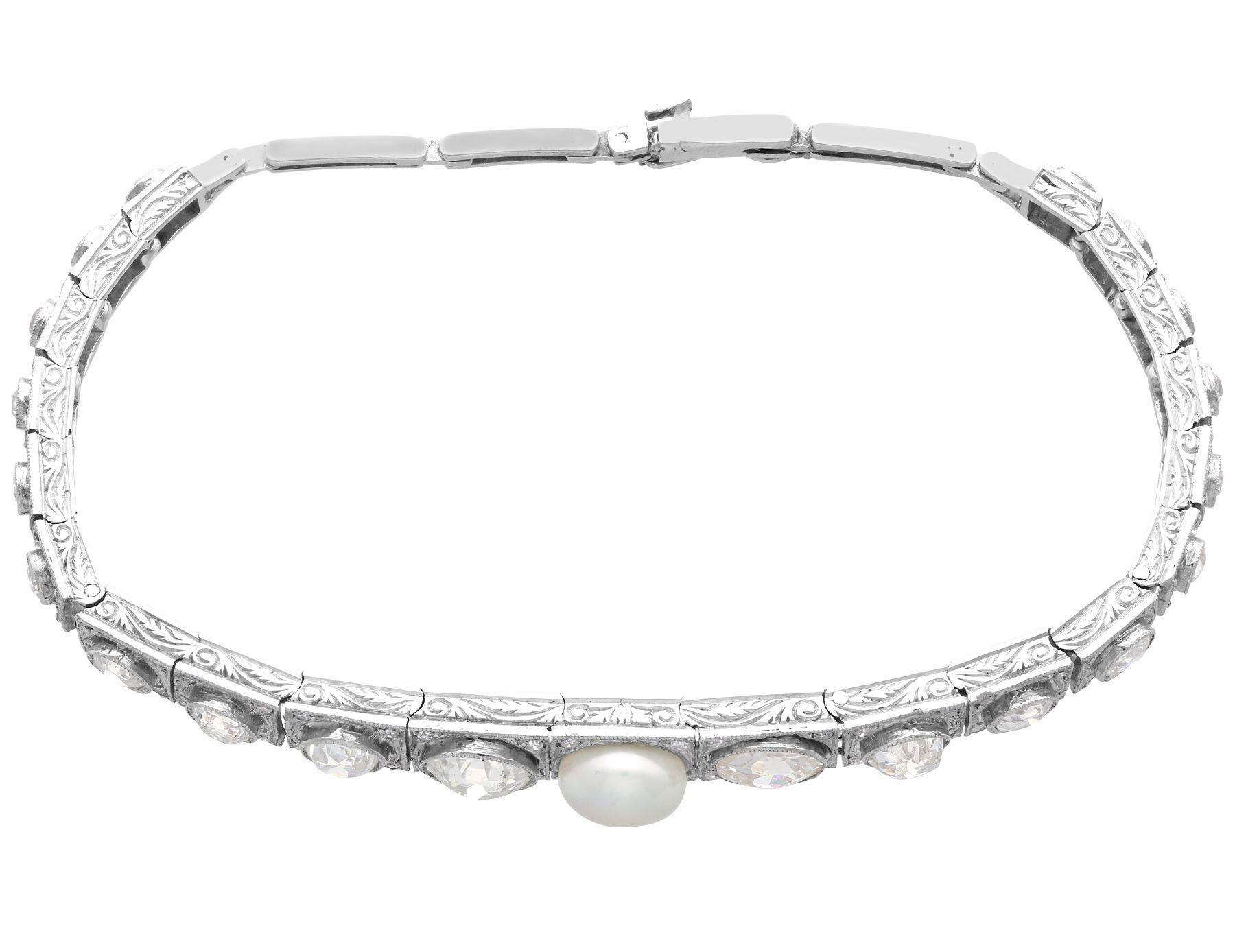 A stunning, fine and impressive 5.61 carat diamond and natural pearl, 18 karat white gold line bracelet; part of our diverse antique jewelry and estate jewelry collections.

This stunning, fine and impressive antique pearl and diamond bracelet has