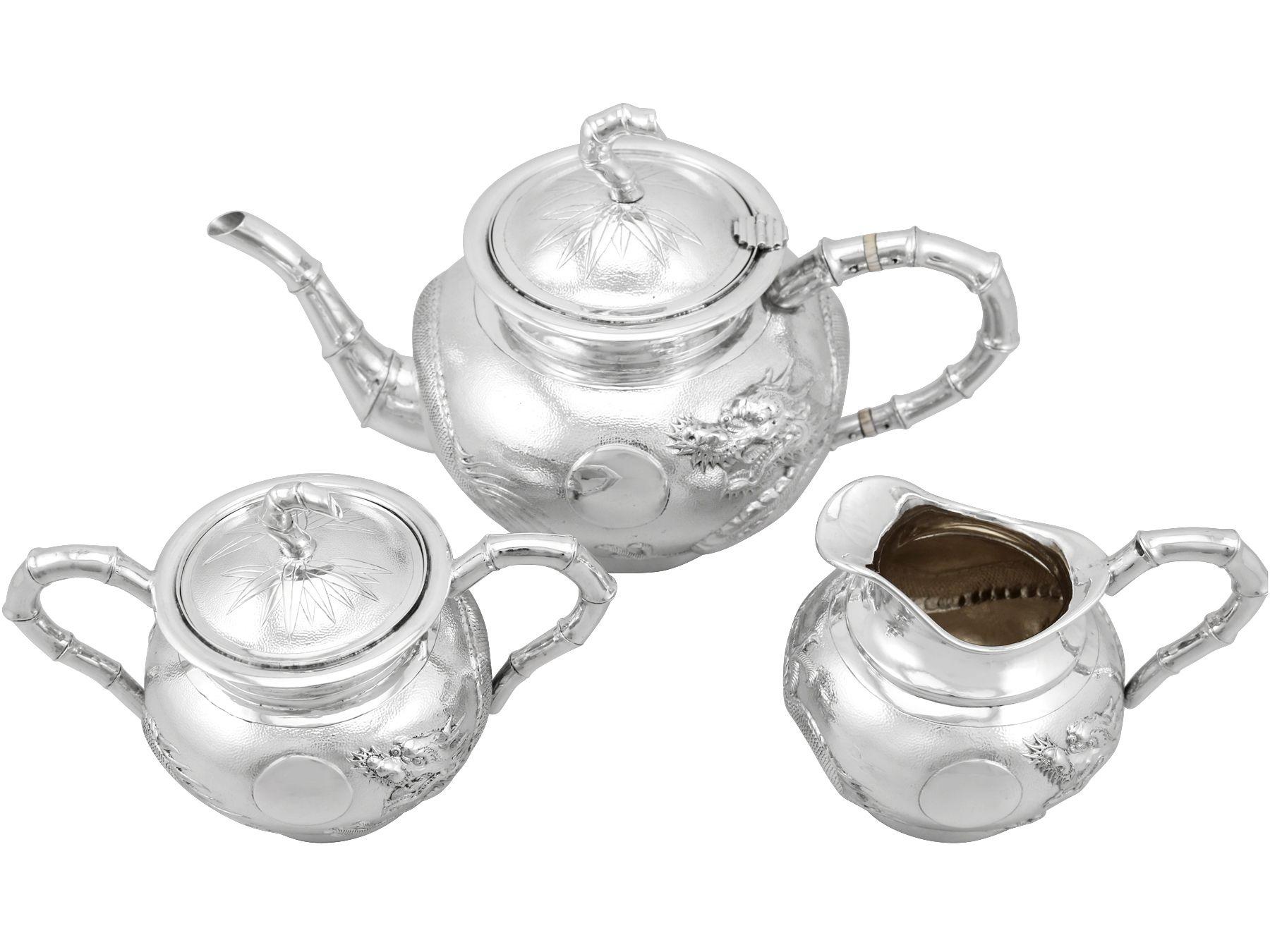 An exceptional, fine and impressive antique Chinese export silver three-piece tea service; an addition to our diverse silver teaware collection.

This exceptional antique Chinese silver tea set / service consists of a teapot, cream jug and covered