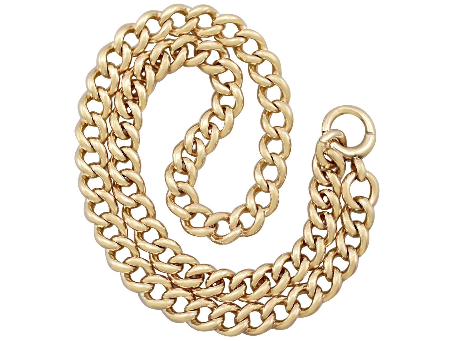 An impressive antique 1900s 15k yellow gold necklace / watch chain; part of our diverse antique jewelry and estate jewelry collections.

This impressive antique Victorian chain has been crafted in 15k yellow gold.

The rounded curb links that make