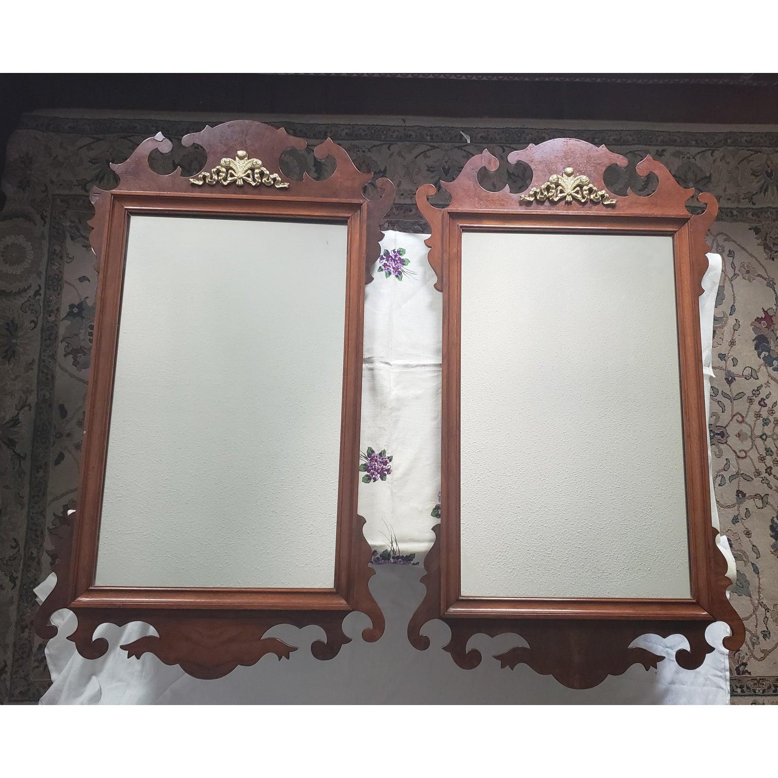 Antique solid mahogany Chippendale mirrors with solid antique brass ornate.
Measures: 23