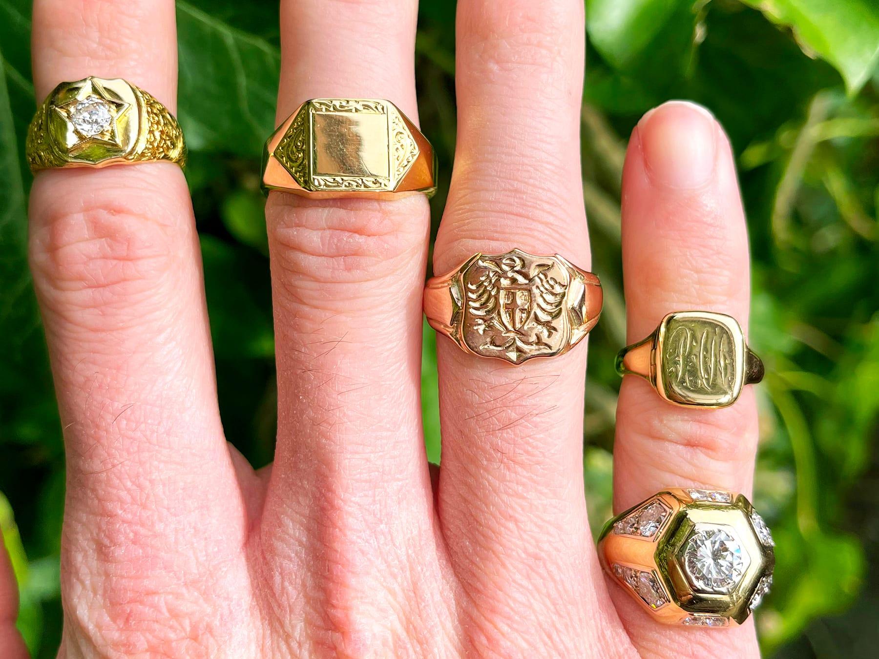 An impressive 18 karat yellow gold signet ring, ornamented with a hidden enamel compartment; part of our diverse antique jewelry and estate jewelry collections.

This fine and impressive signet ring has been crafted in 18k yellow gold.

The rounded
