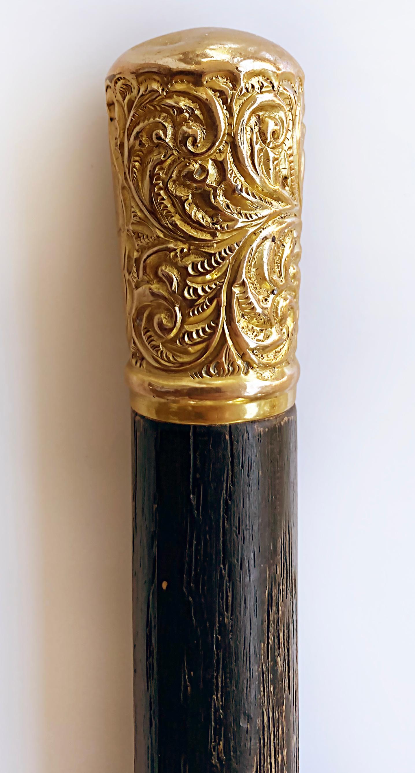 gold topped walking cane