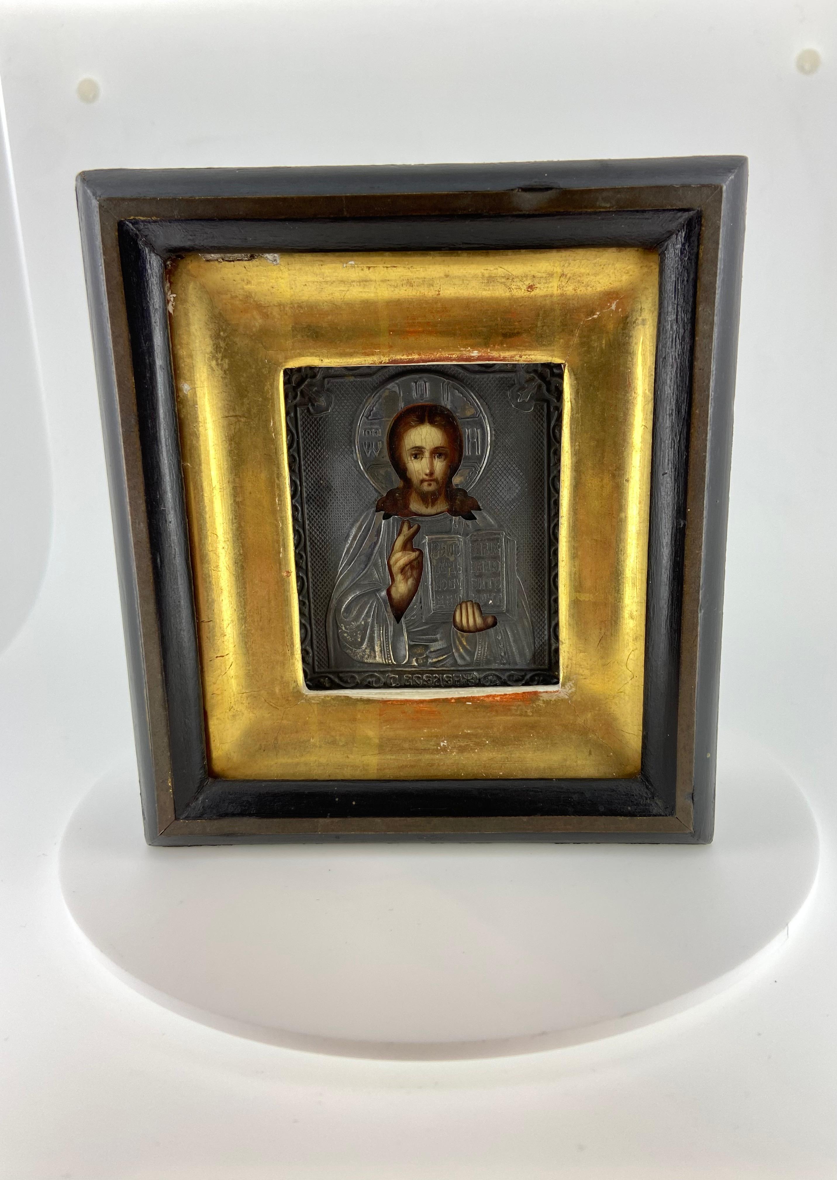Antique Russian 84 Silver Icon,
in wooden box & gilt frame, 

featuring stunning Solid Silver Riza / oklad 

finely pierced to expose elements of underlying painting - 
Jesus Christ Pantocrator

Featuring a gorgeous embossing throughout & 
is