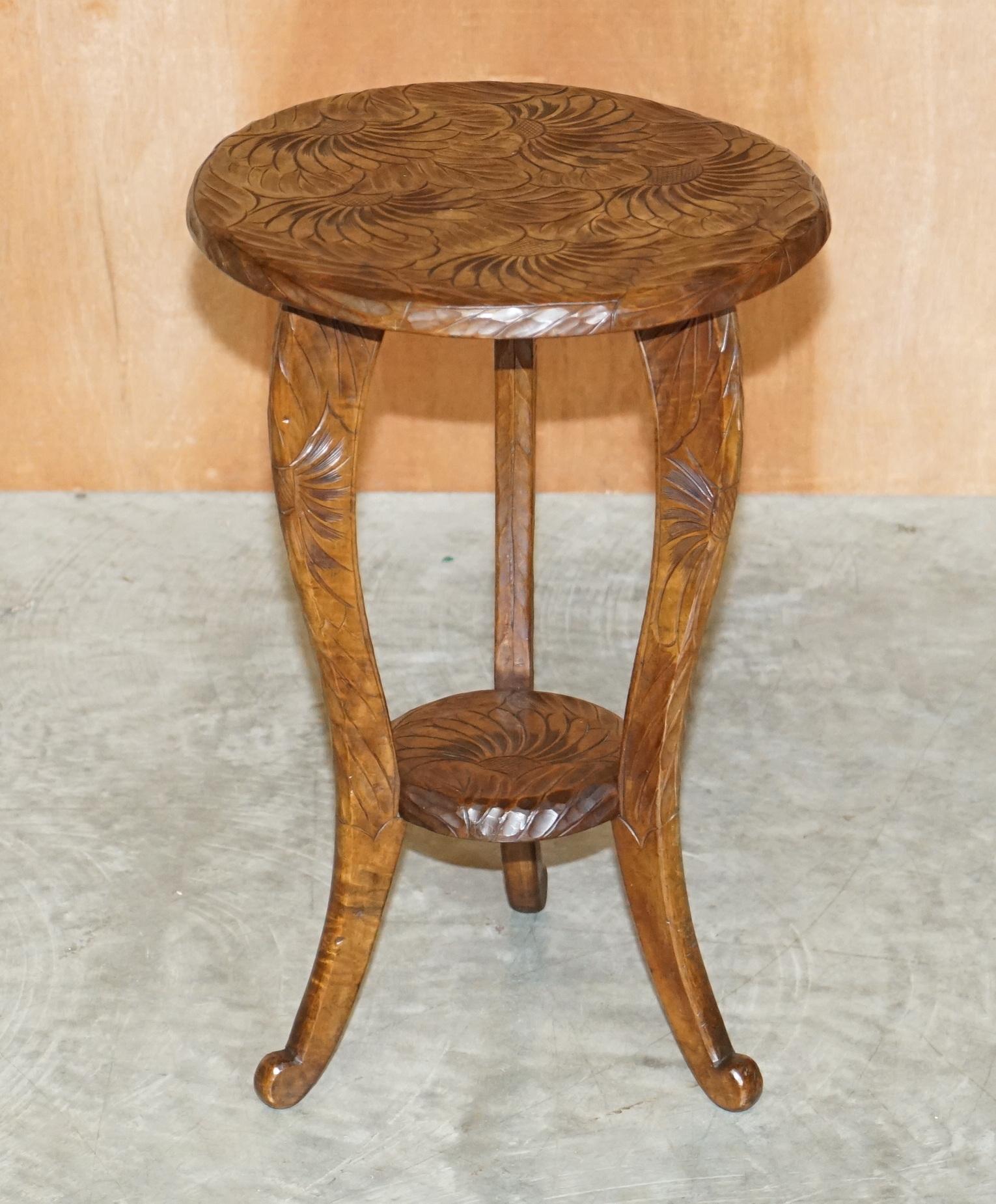 We are delighted to offer for sale this lovely Liberty’s London 1905 oriental mahogany side table.

A good-looking piece, its hand carved from top to bottom with floral detailing, I have variations of these types of tables and one very rare chair