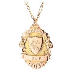 Antique 1906 Edwardian 9 Carat Yellow Gold Shield Crest Pendant & Figaro Chain