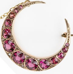 Antique 1909 Crescent Moon Brooch in 9 Carat Gold Garnet and Rose Cut Diamonds