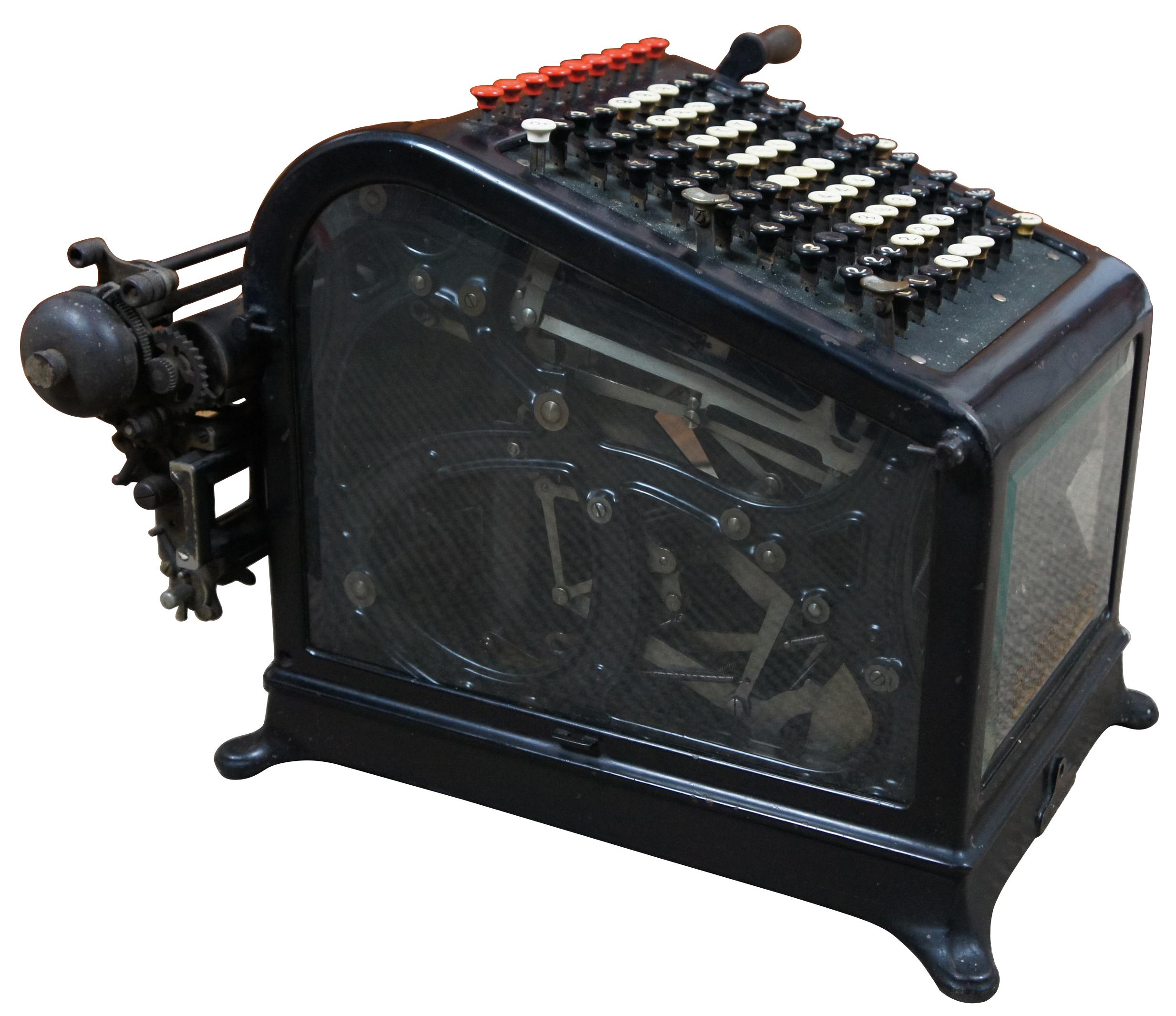 Antique bookkeeping or adding machine by Burroughs Adding Machine Company, Class 1 No. 9 high keyboard machine, serial number 136487, produced between 1909-1910. Features very heavy industrial cast iron frame with beveled glass.
 