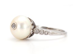 Bague ancienne 1910 en platine avec perles et diamants