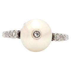 Bague ancienne 1910 en platine avec perles et diamants