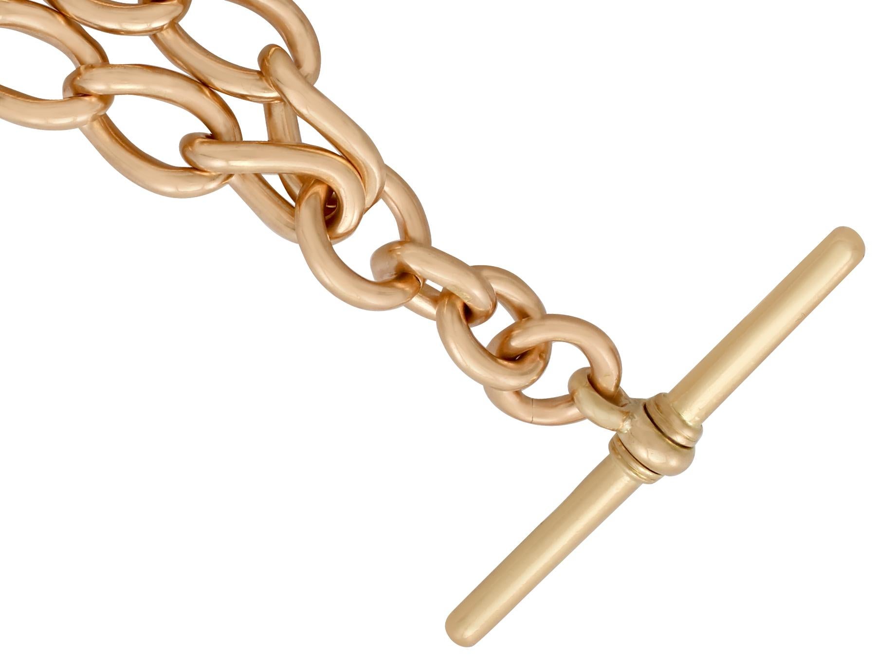 An exceptional antique 18 karat yellow gold Albert chain; part of our diverse antique jewelry and estate jewelry collections.

This exceptional, fine and impressive antique watch chain has been crafted in 18k yellow gold.

The Albert chain is