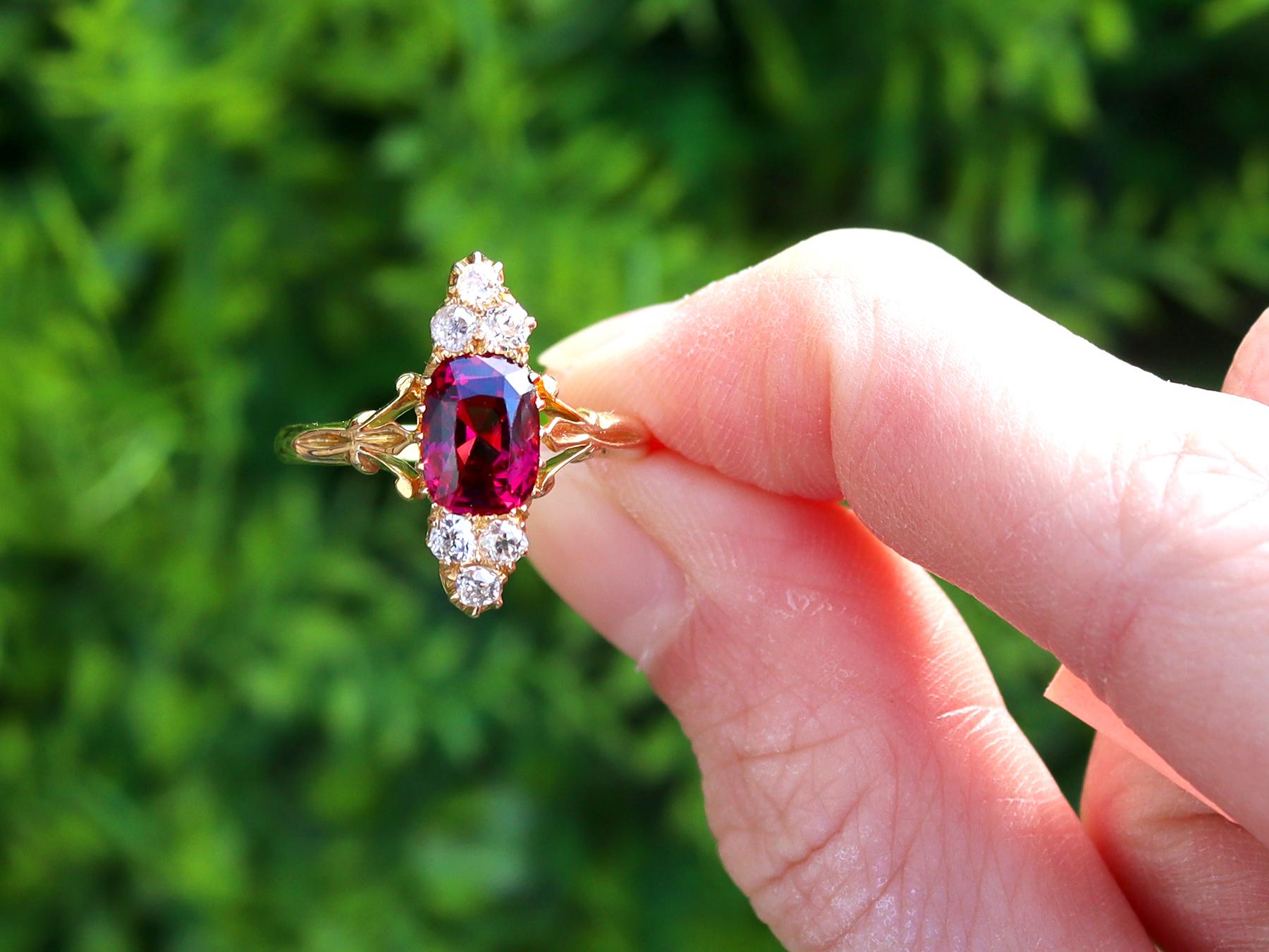 A fine and impressive vintage 2.48 carat garnet and 0.30 carat diamond, 18 karat yellow gold dress ring; part of our diverse vintage jewelry collections.

This fine and impressive antique garnet ring has been crafted in 18k yellow gold.

The pierced