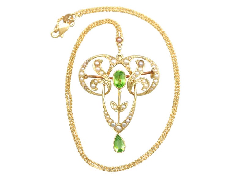 Oval Cut Antique 1910s Art Nouveau Peridot and Seed Pearl Yellow Gold Pendant / Brooch For Sale