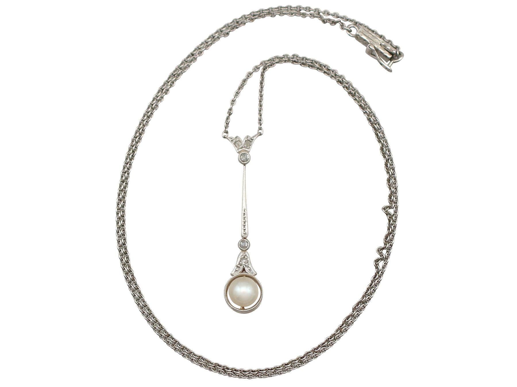 An impressive antique seed pearl and 0.05 carat diamond, 14 karat yellow gold and silver set necklace; part of our diverse antique jewelry collections.

This fine and impressive pearl necklace with diamonds has been crafted in 14k yellow gold with a