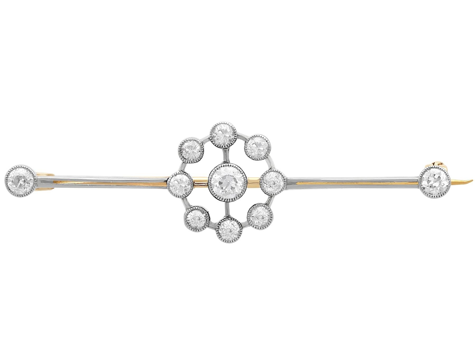 A fine and impressive antique 0.92 carat diamond and 18 karat yellow gold, platinum set bar brooch; part of our antique jewelry and estate jewelry collections.

This fine antique diamond bar brooch has been crafted in 18k yellow gold with a platinum