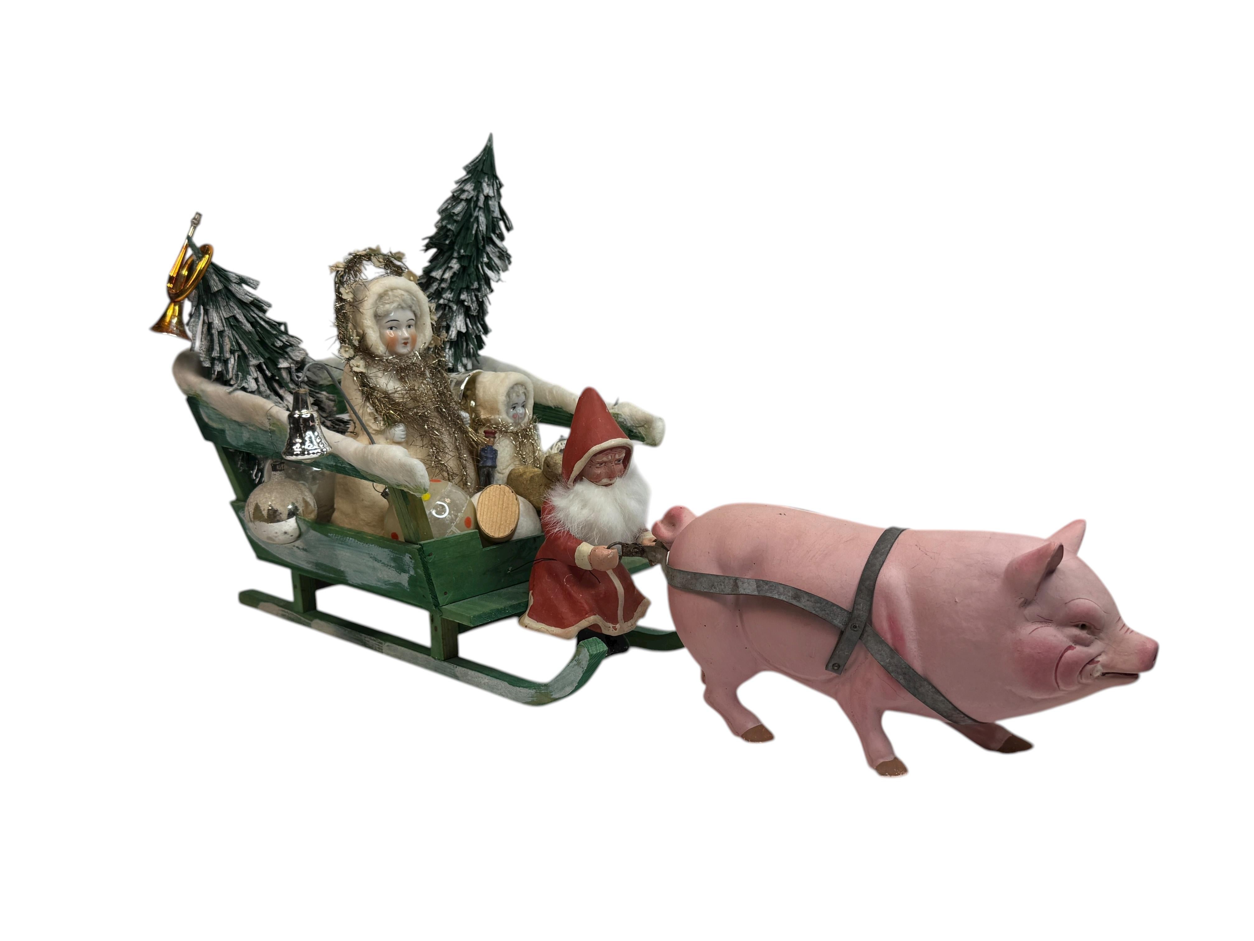 Antica slitta tedesca di Babbo Natale Belsnickle con maiale e giocattoli, circa 1900

Un raro e affascinante esempio di artigianato natalizio tedesco, questa figura di Charme Antiques Belsnickle raffigura Babbo Natale seduto su una slitta trainata