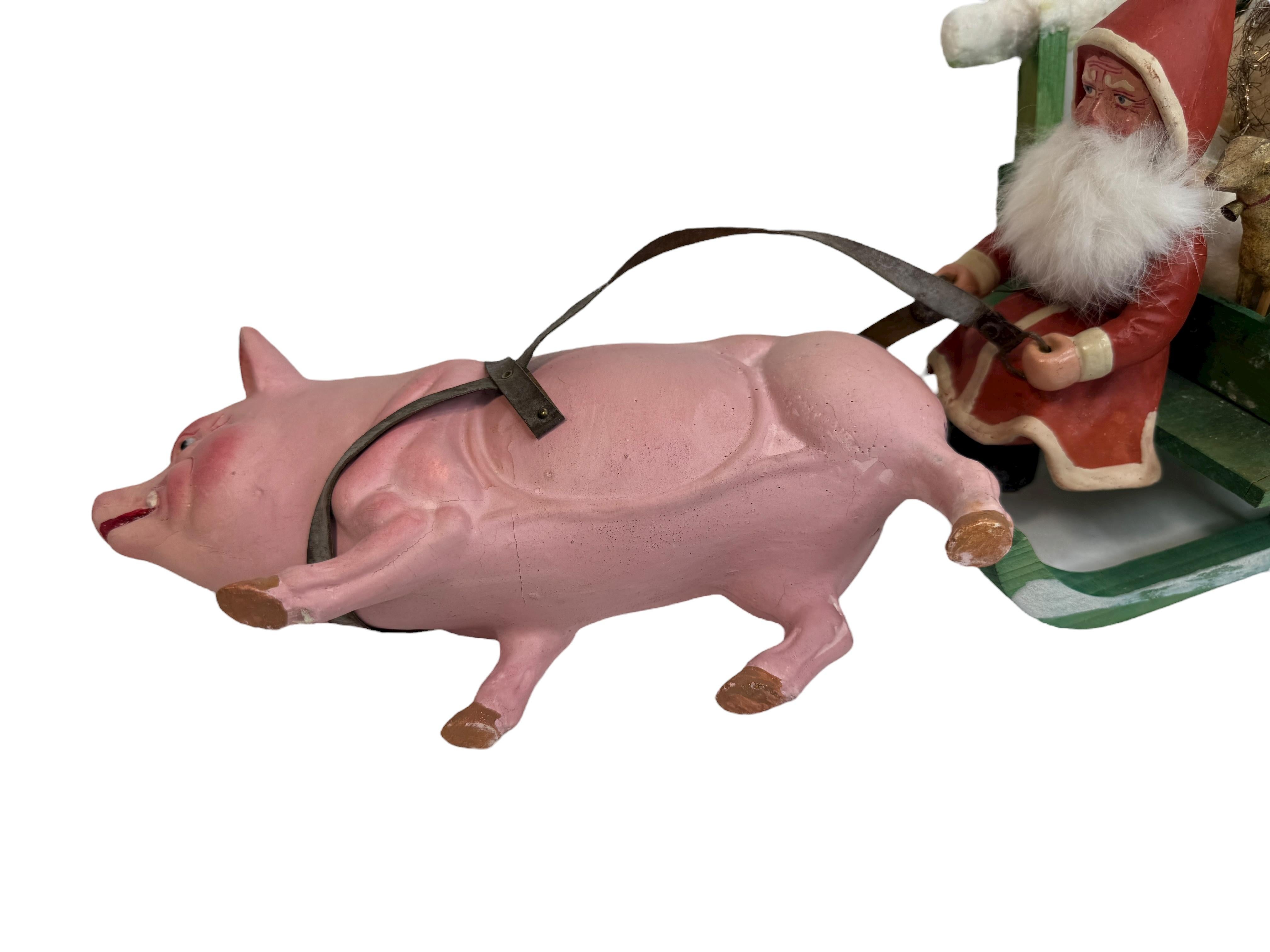 Porcellana Antico Babbo Natale tedesco del 1910 con figura di Belsnickle su slitta trainata da un maiale rosa in vendita