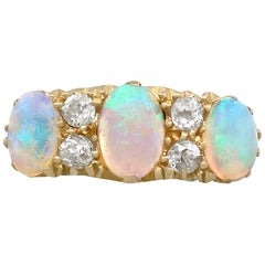 Antique 1911 1.74 Carat Opal and Diamond Yellow Gold Cocktail Ring