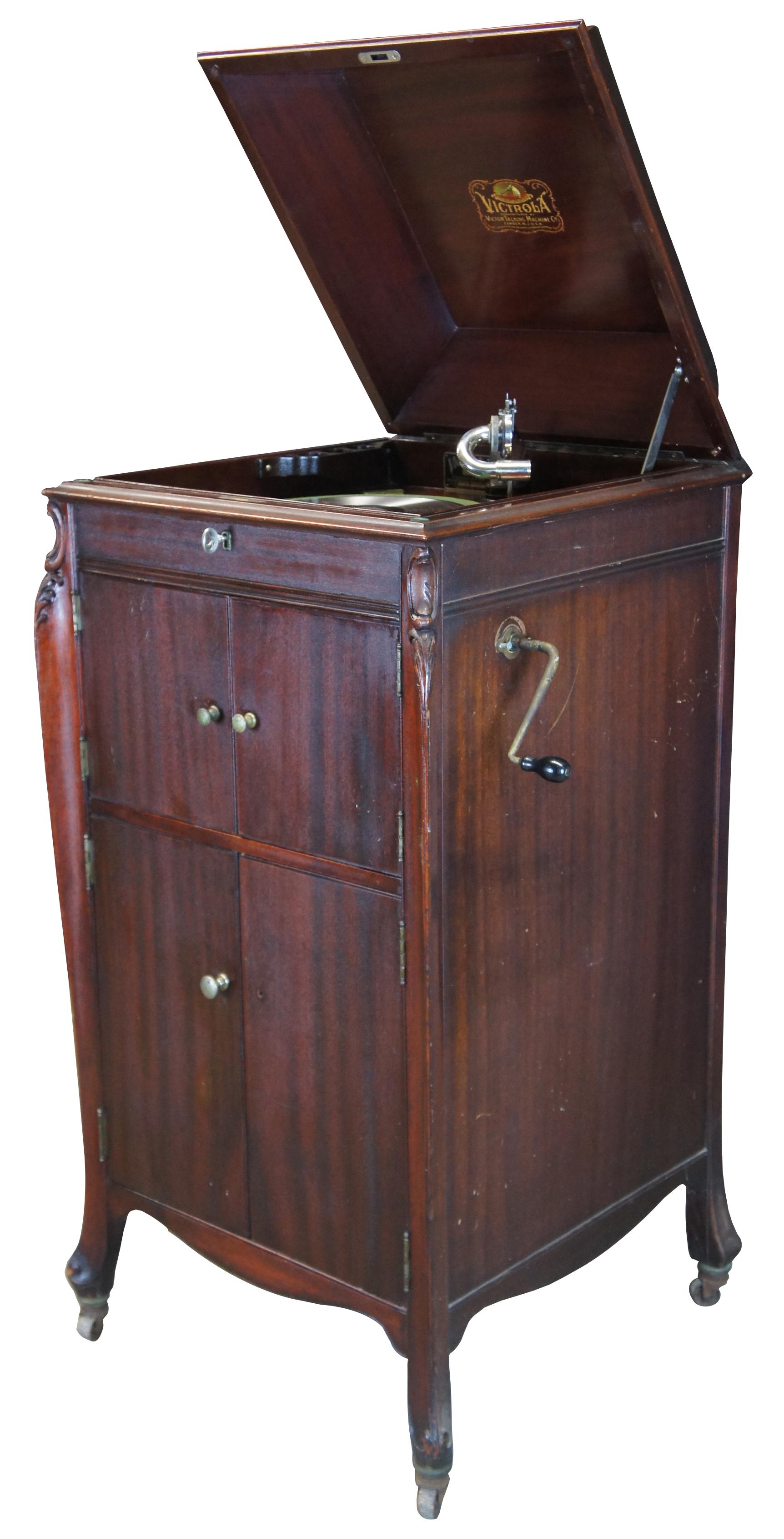 Victor Victrola talking machine VV-XIV, Iteration Two, circa 1913. 

The XIV was completely redesigned in early 1912, with a slightly smaller cabinet and far more proportioned appearance. Nickel plating was used in place of gold, the three-spring