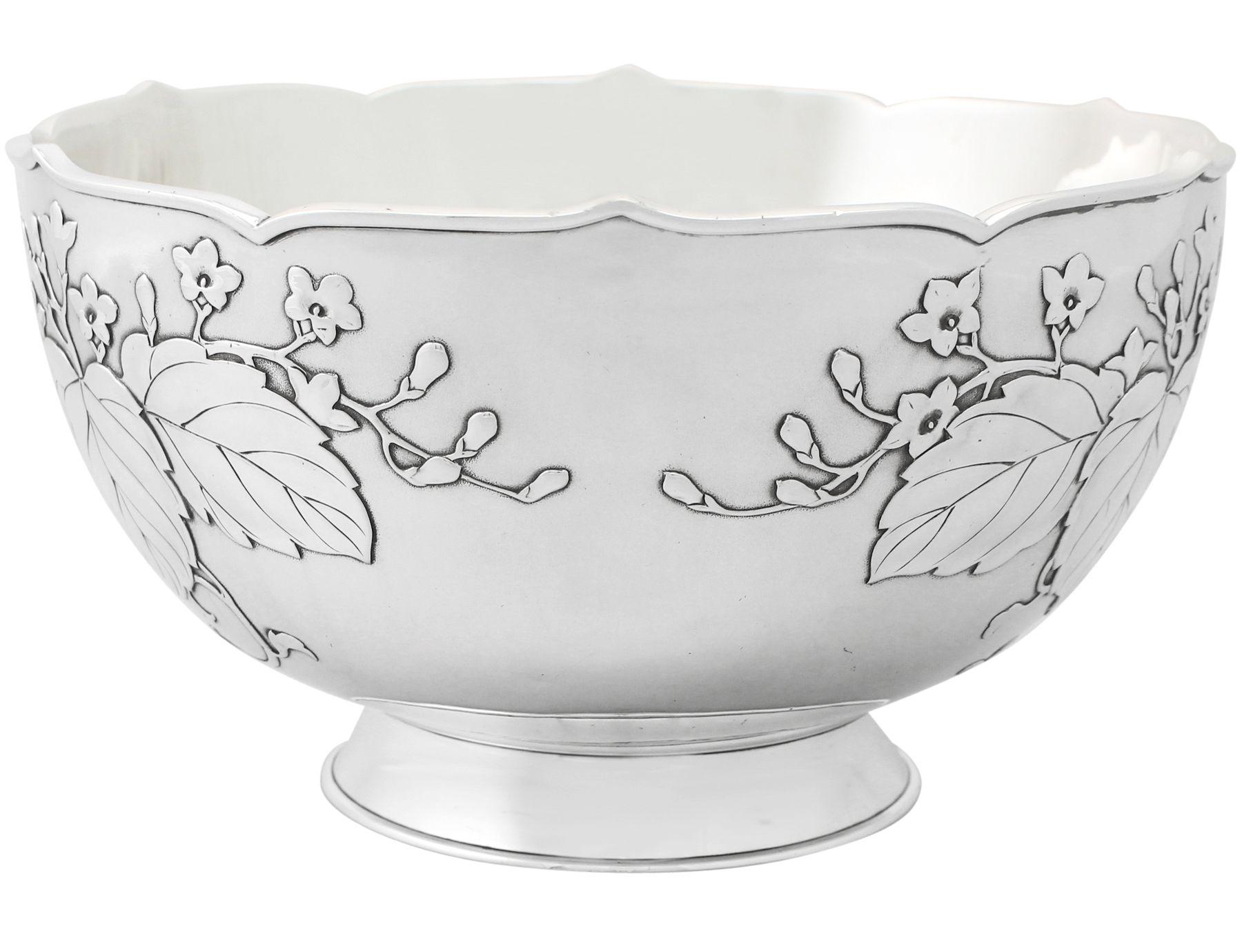 An exceptional, fine and impressive antique Japanese pure silver presentation bowl; part of our Asian silverware collection.

This exceptional antique Japanese silver bowl has a circular rounded form onto a plain circular spreading collet