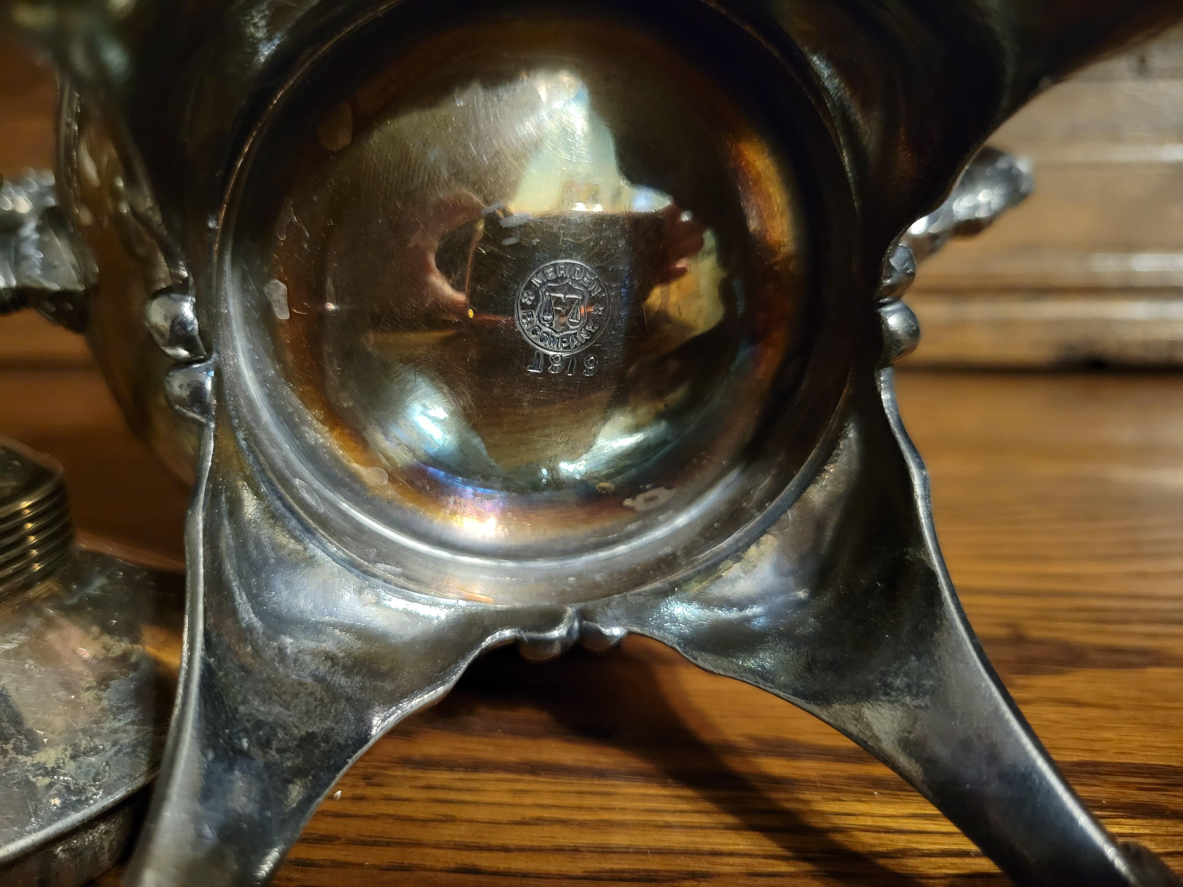 Repoussé Antique, 1919, Meriden Britannia Company Silverplated Urn  For Sale