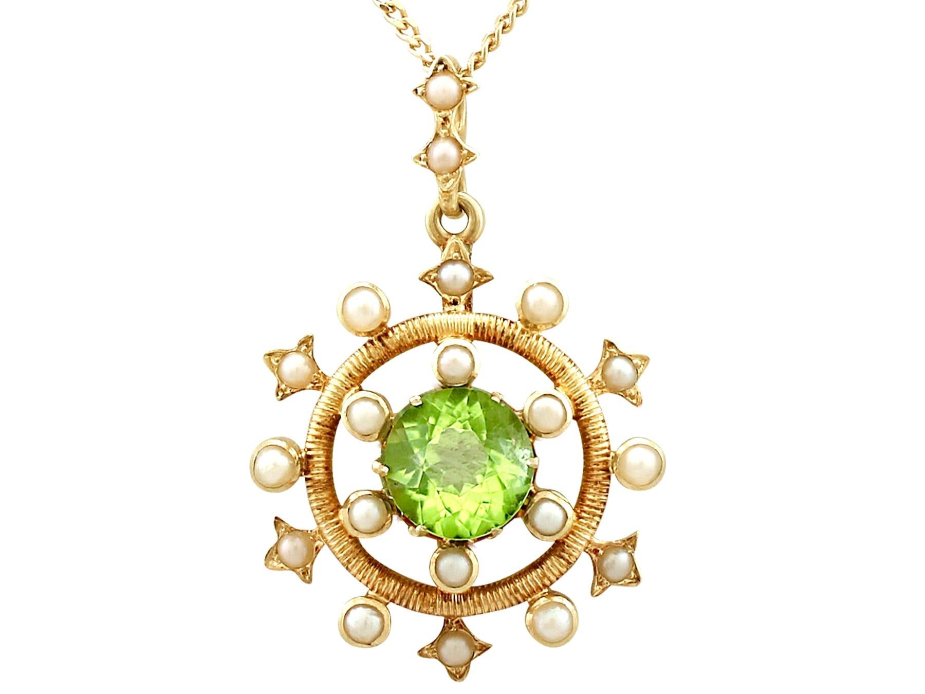 An impressive antique 1900s 1.92 carat peridot and seed pearl, 15 karat yellow gold pendant; part of our diverse antique jewelry and estate jewelry collections.

This fine and impressive antique peridot pendant with pearls has been crafted in 15k