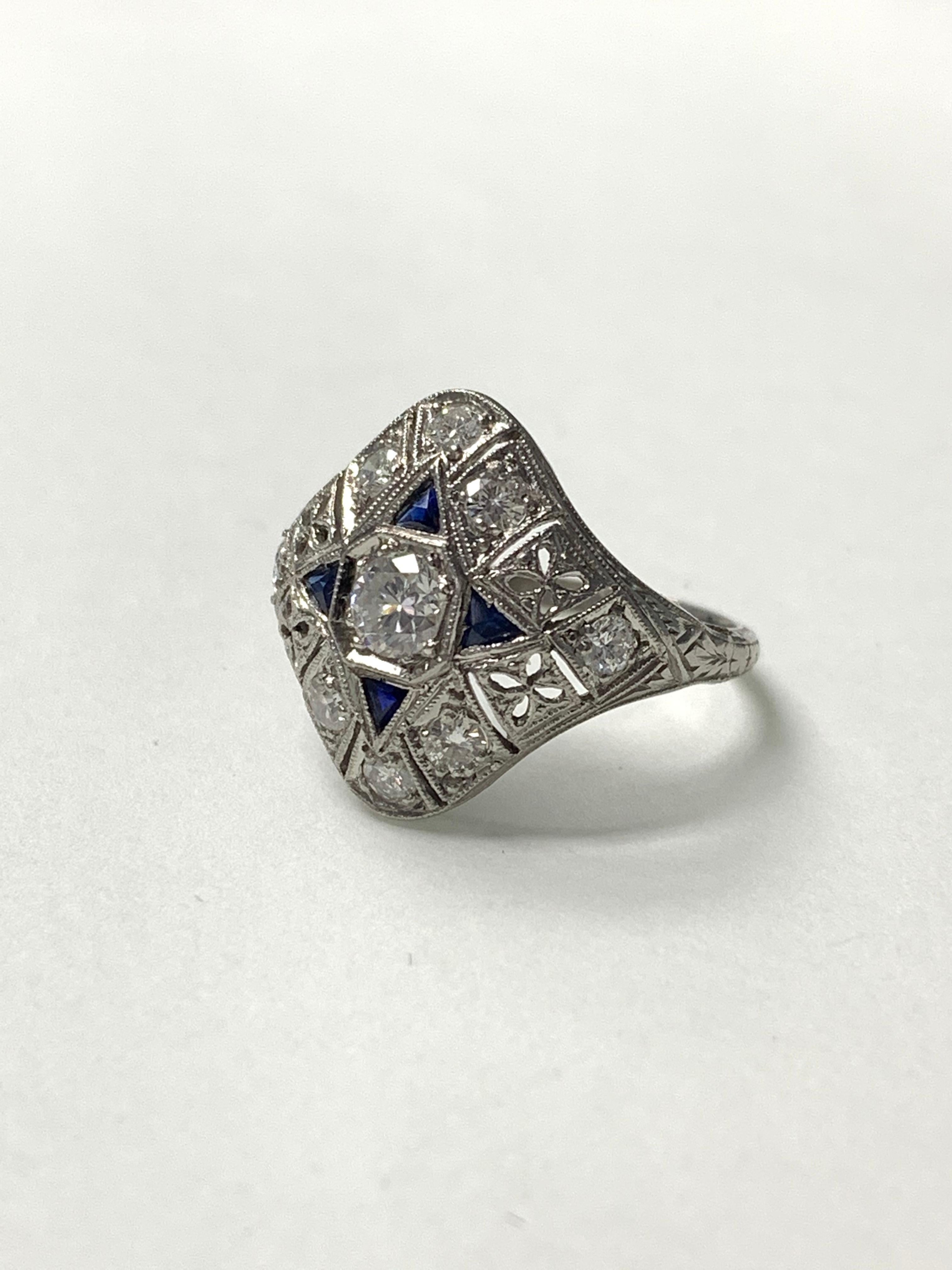 Antique 1920 White old european cut diamond and blue sapphire ring handcrafted in platinum. 
The details are as follows : 
Diamond weight : 1 carat ( I VS2 ) 
Diamond weight : 0.20 carat ( H VS ) 
Ring size : 5