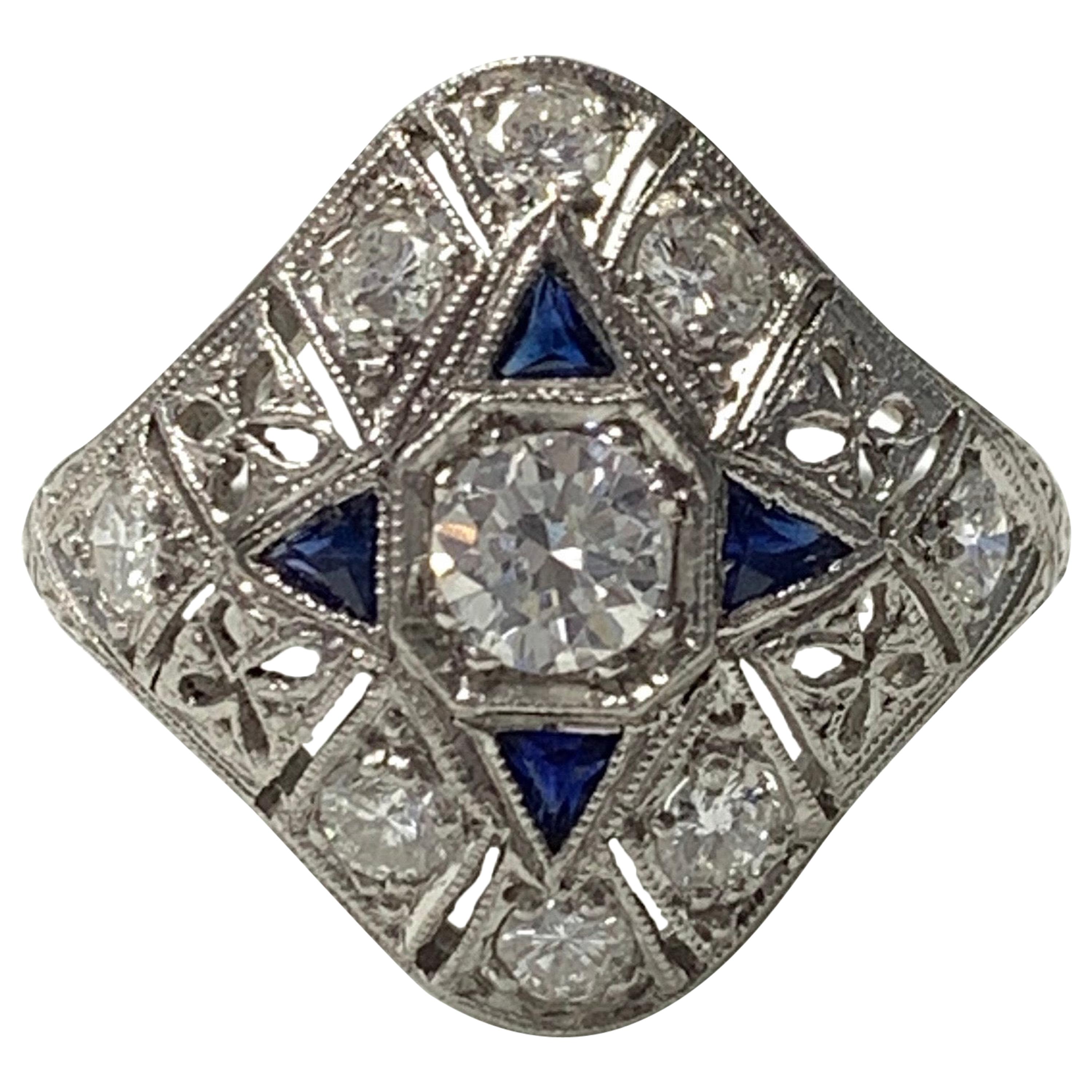 Antique 1920 White Old European Cut Diamond and Blue Sapphire Ring in Platinum