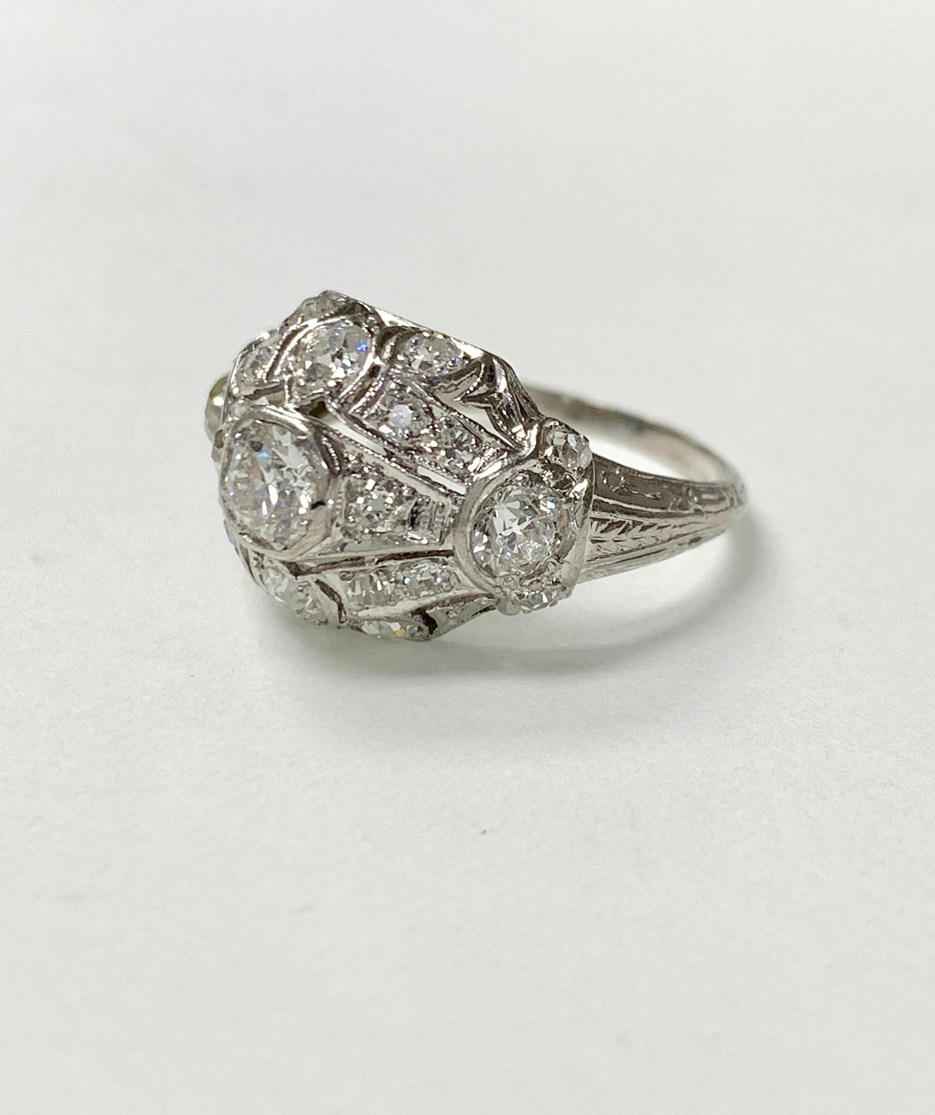 Antique 1920 White Old European Cut Diamond Ring In Platinum. 
The details are as follows: 
Old European cut diamond weight : 1 carat ( GH color and VS clarity ) 
Metal : Platinum 
Ring size : 7 1/2 
Measurements: 1/2 inch wide 

