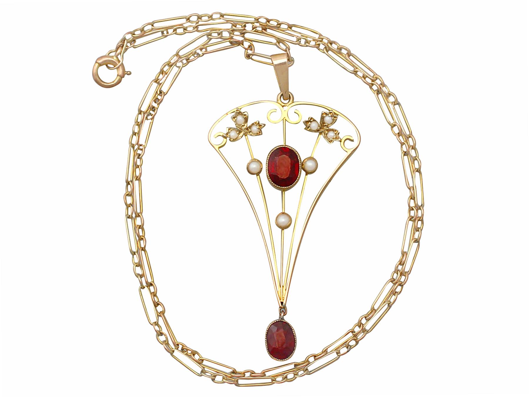 Oval Cut Antique 1920s 1.02 Carat Garnet and Seed Pearl Yellow Gold Pendant For Sale