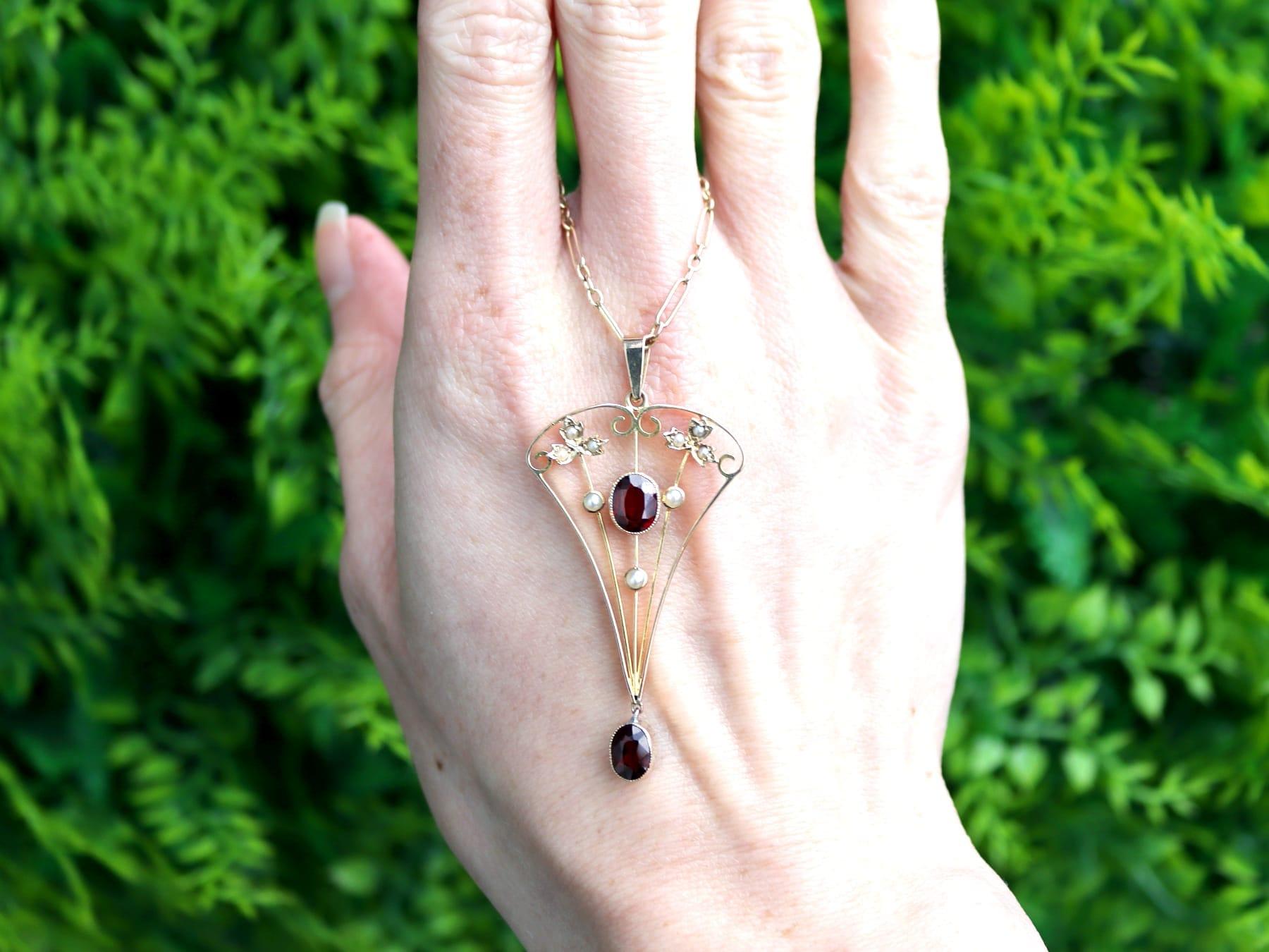 A fine and impressive 1.02 carat garnet and seed pearl, 9k yellow gold pendant; part of our diverse gemstone jewelry and estate jewelry collections.

This fine and impressive antique garnet and pearl pendant has been crafted in 9k yellow gold.

The