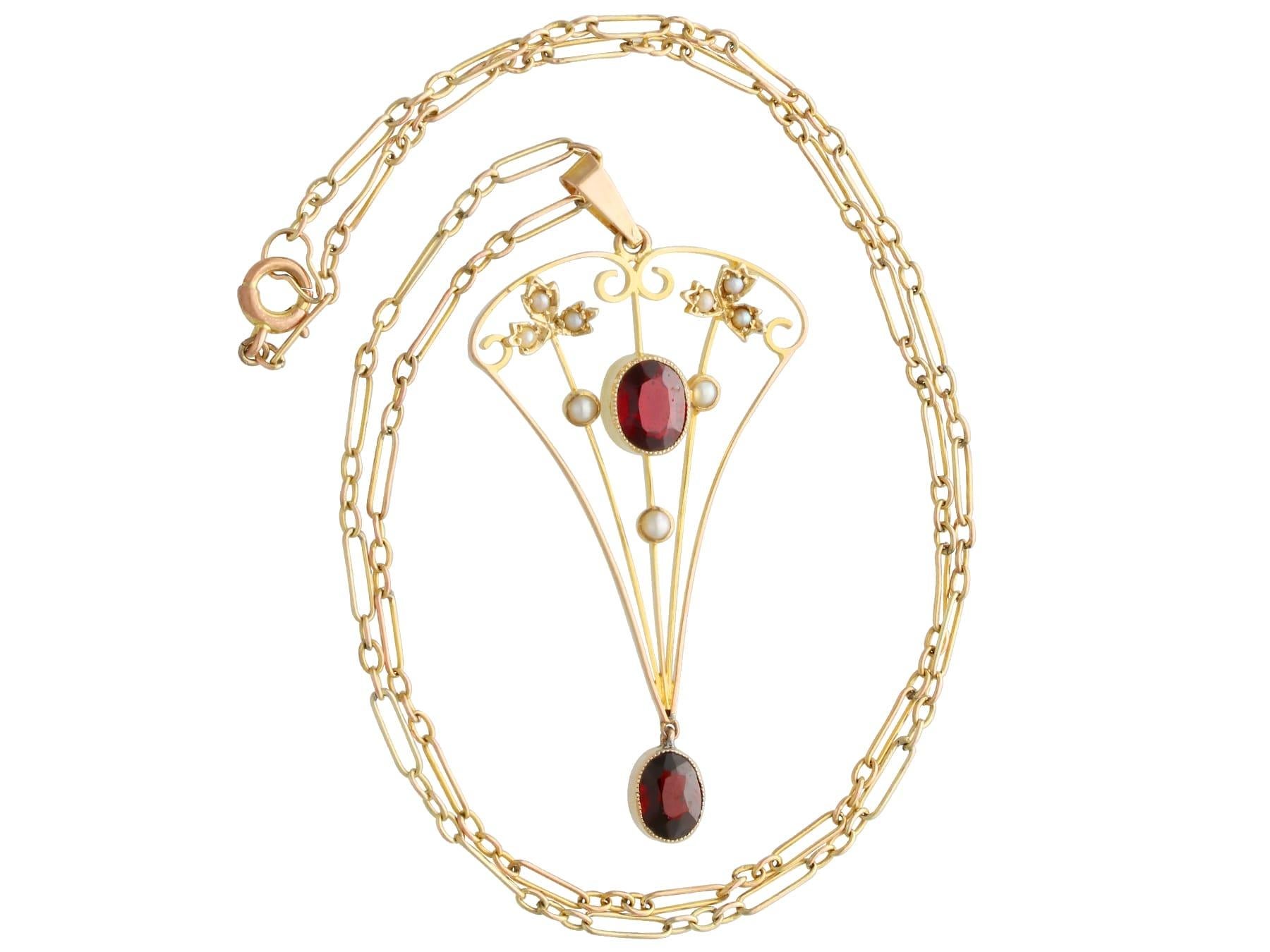 Oval Cut Antique 1920s 1.02 Carat Garnet and Seed Pearl Yellow Gold Pendant For Sale