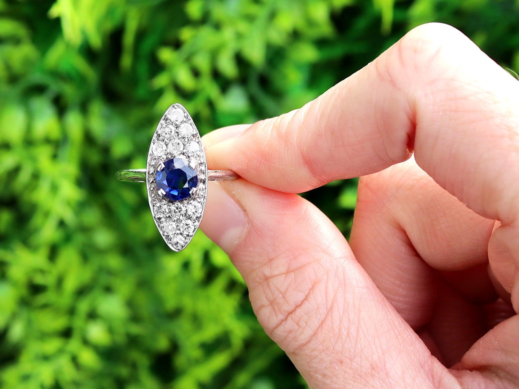 A fine and impressive antique 1.02 natural blue sapphire and 0.84 carat diamond dress ring in 18 karat white gold; part of our diverse range of gemstone jewelry.

This impressive antique sapphire dress ring has been crafted in 18k white gold.

The