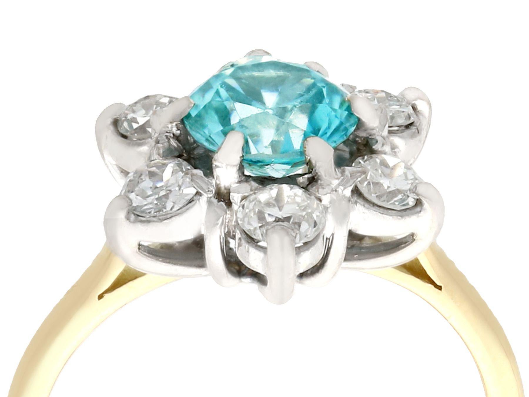 A fine and impressive antique 1.18 carat blue zircon and 0.60 carat diamond, 18 karat yellow gold cocktail ring; part of our diverse gemstone ring and estate jewelry collections.

This fine antique zircon dress ring has been crafted in 18k yellow
