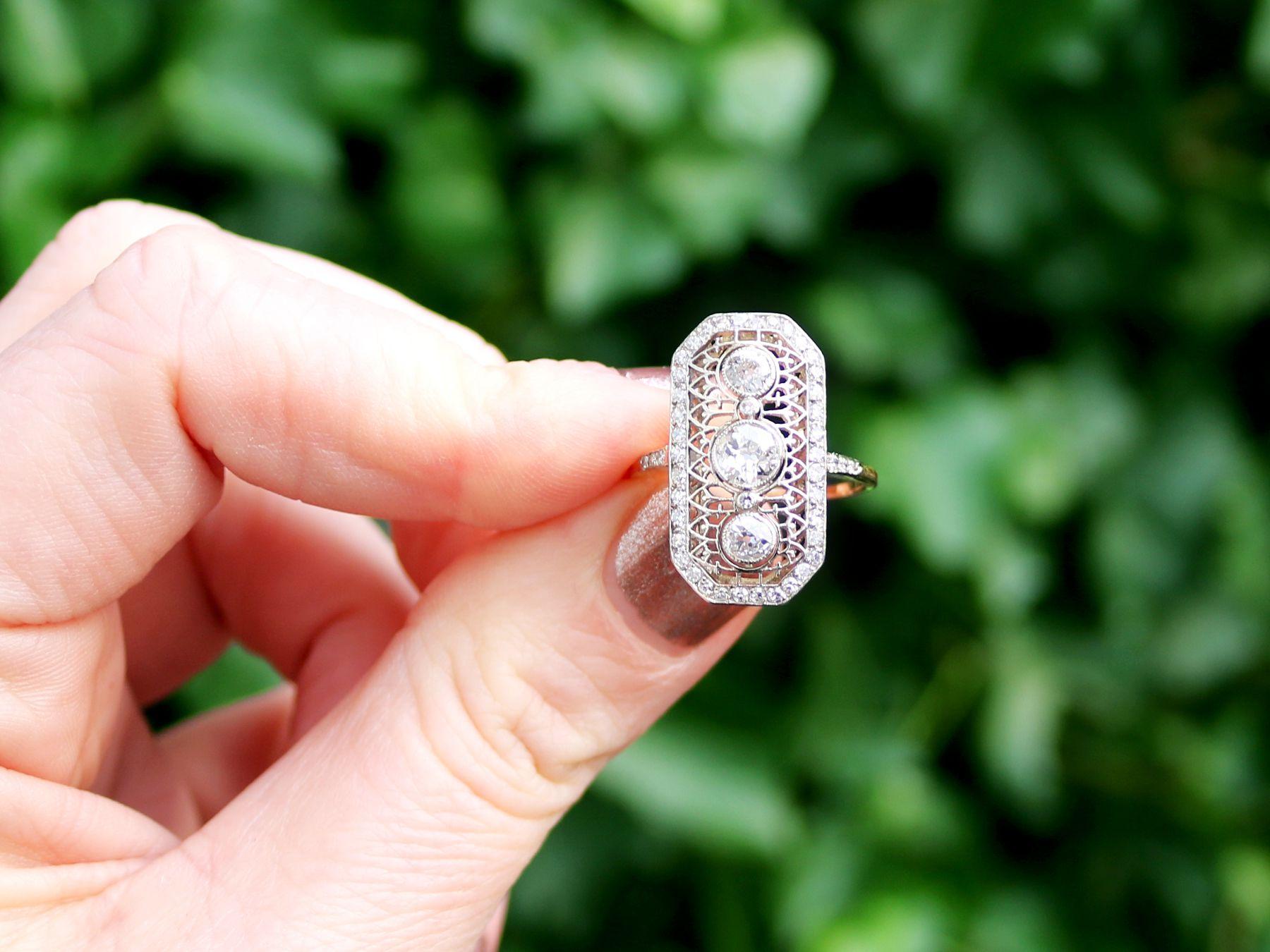 A stunning antique 1920s 1.26 carat diamond and 18 karat yellow gold, platinum set dress ring; part of our diverse antique jewelry and estate jewelry collections.

This stunning, fine and impressive antique 1920s diamond ring has been crafted in 18k