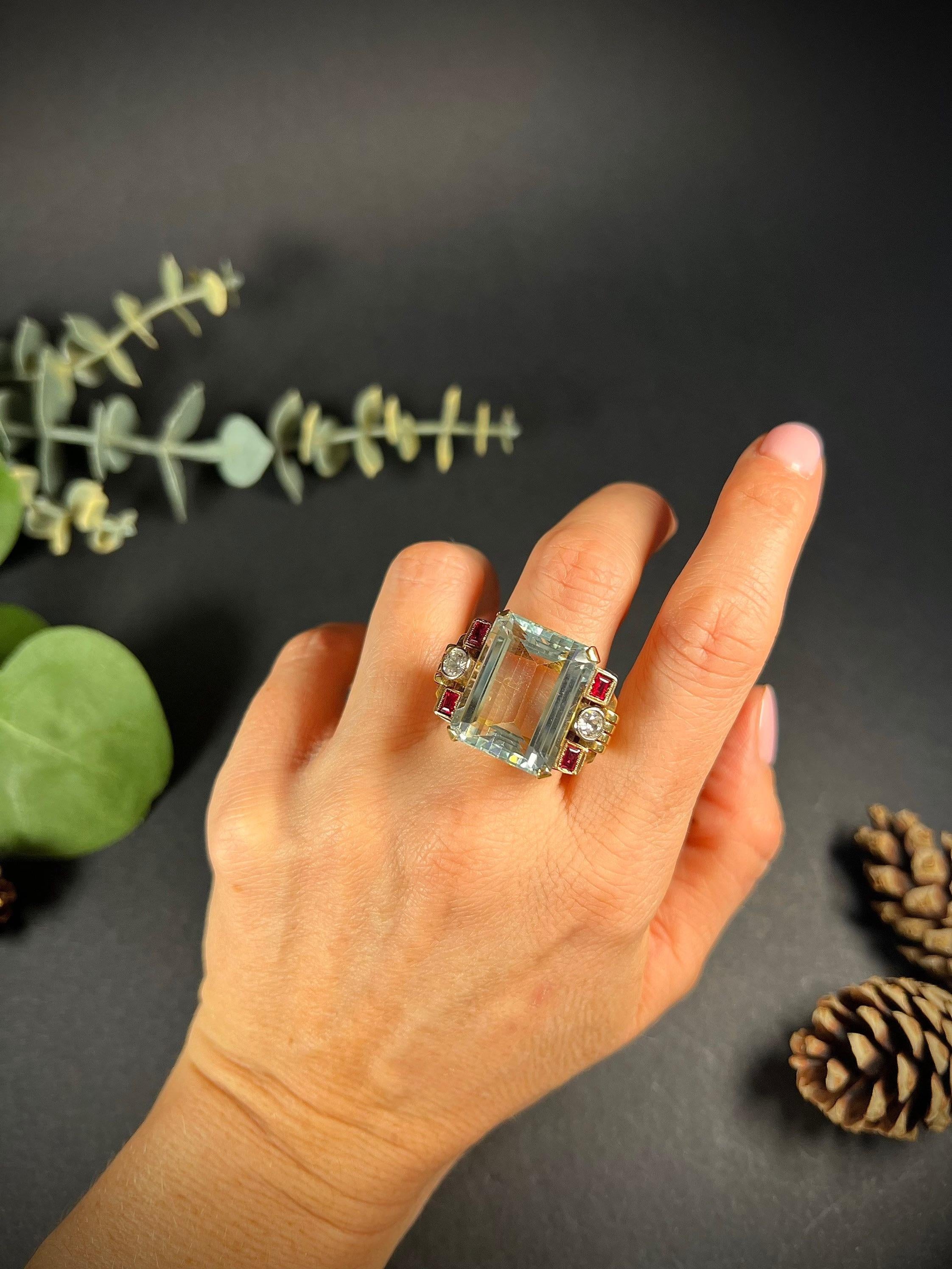 Antique Cocktail Ring 

18ct Rose Gold 

Circa 1920’s

Fabulous 1920’s art deco, aquamarine cocktail ring. Set with a beautiful, large, emerald cut-natural aquamarine. 
With two 0.40 carat old cut diamonds on either side, they are G colour and SI