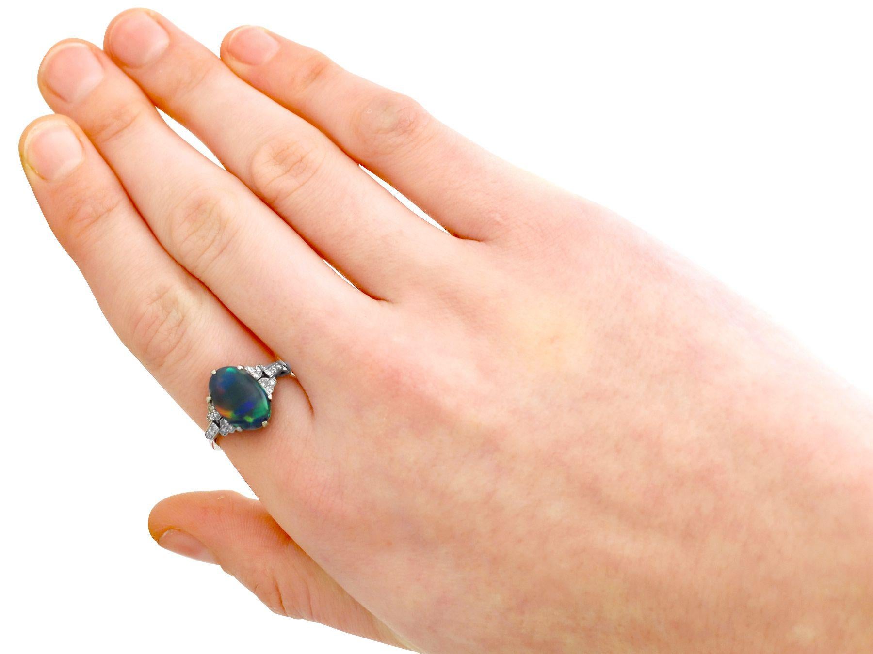 Oval Cut Antique 1920s 2.05Ct Cabochon Cut Black Opal and Diamond Platinum Cocktail Ring