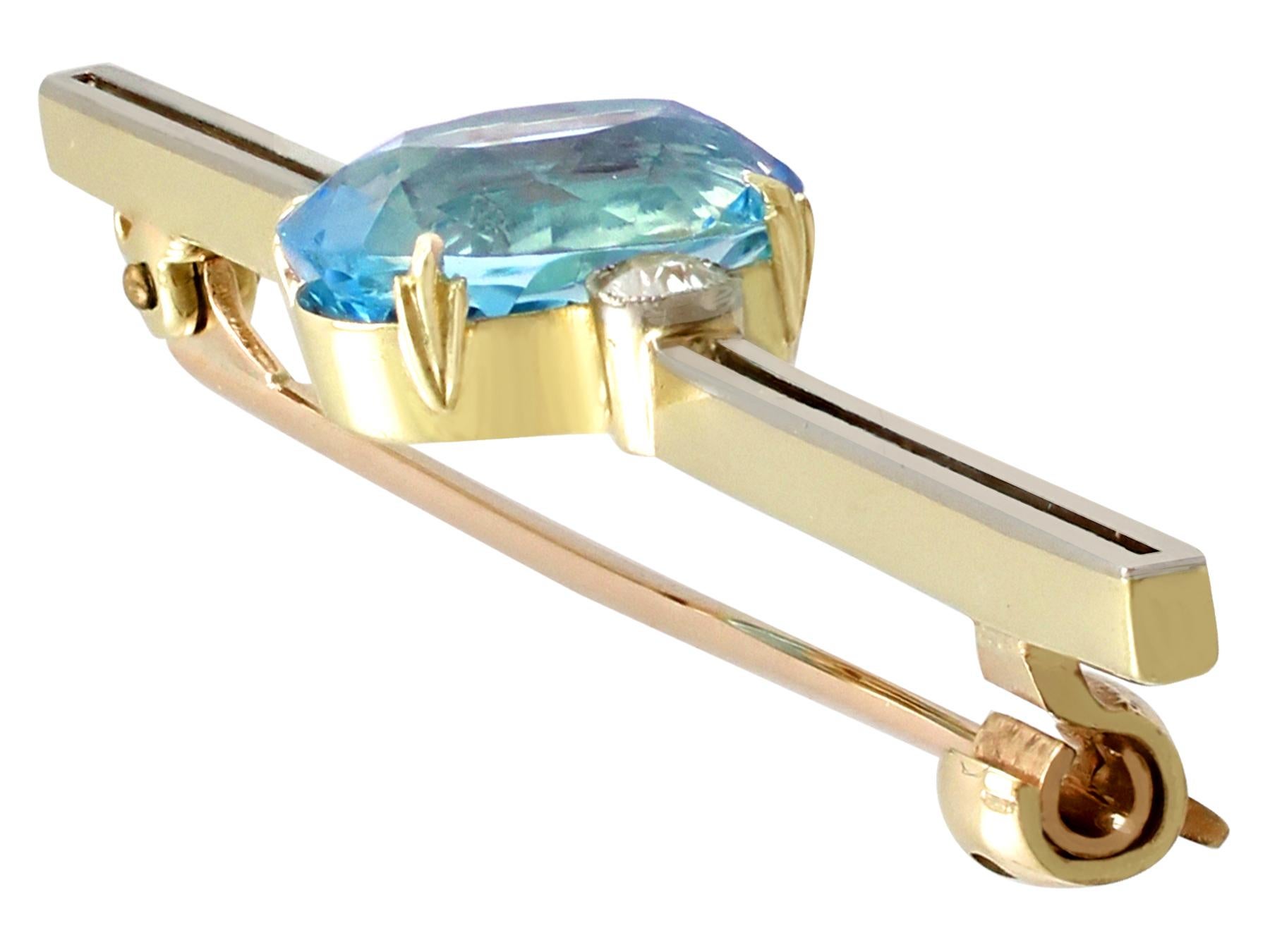 An impressive antique 1920s 2.27 carat aquamarine and 0.08 carat diamond, 12 karat yellow gold and platinum set bar brooch; part of our diverse antique jewelry collections.

This fine and impressive antique brooch has been crafted in 12k yellow gold