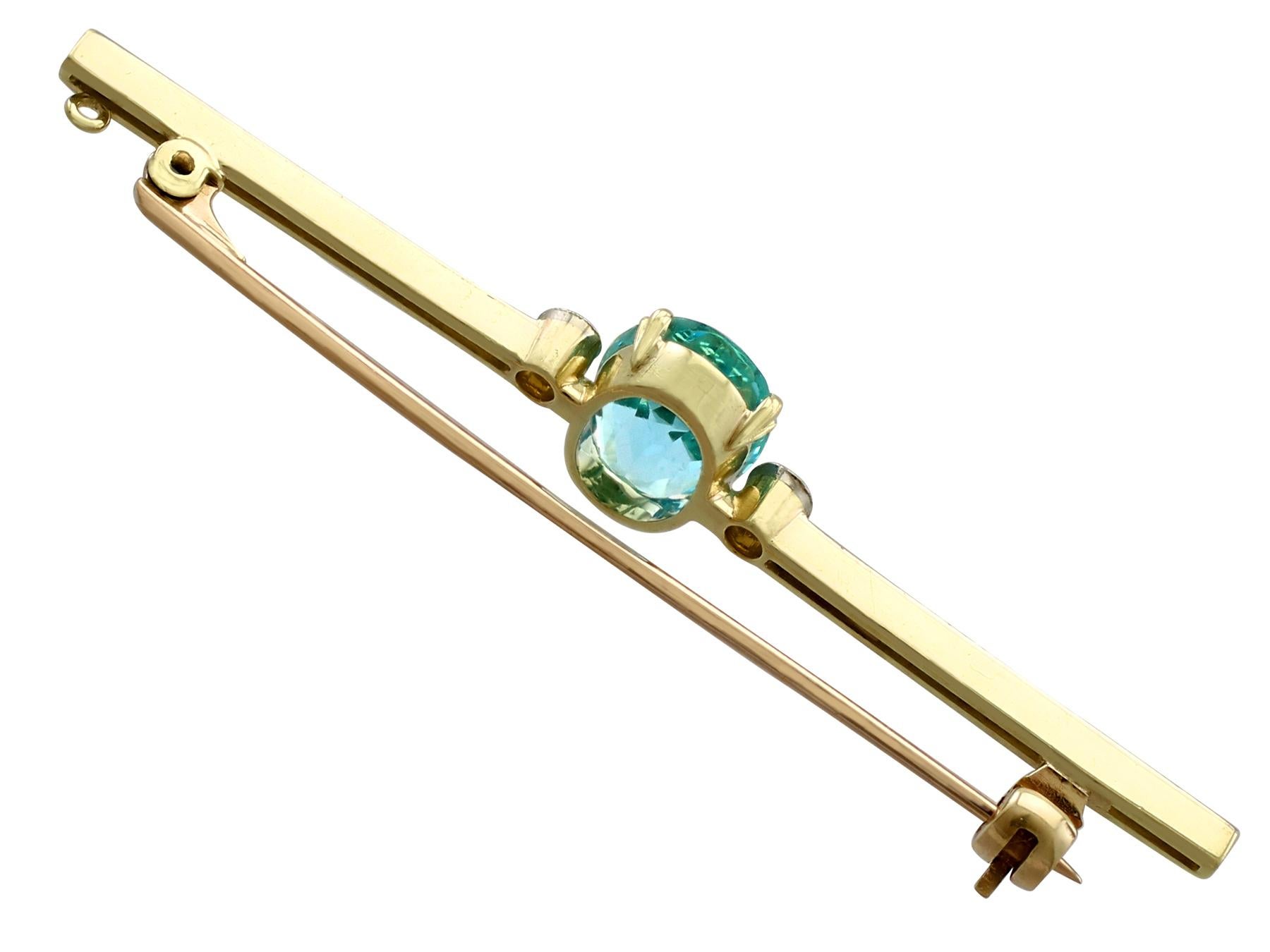 Oval Cut Antique 1920s 2.27 Carat Aquamarine and Diamond Yellow Gold Bar Brooch For Sale