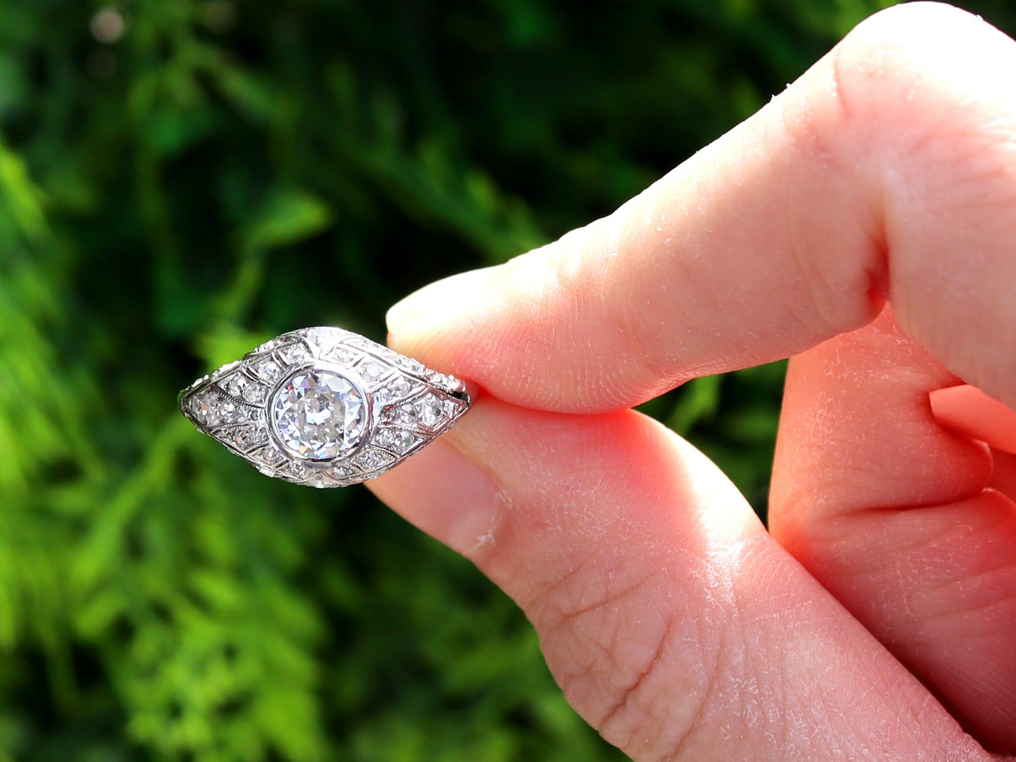 A stunning, fine and impressive antique 1920s Art Deco 1.14 carat diamond and platinum dress ring; part of our diverse antique Art Deco jewellery collections.

This stunning, fine and impressive Art Deco ring has been crafted in platinum.

The