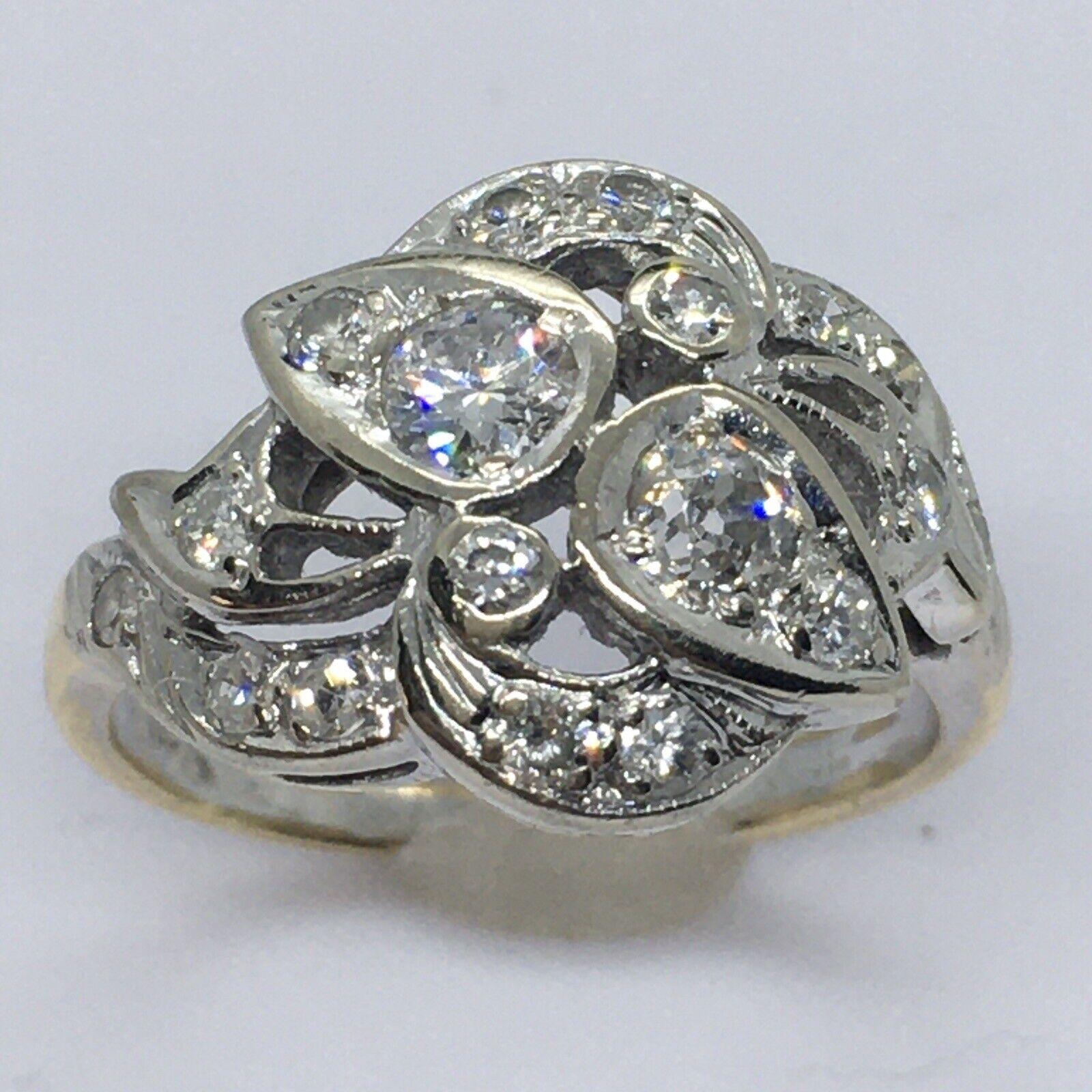 
Antique 1920s Art Deco 14K gold 1/2 Carat Diamond American Filigree Ring 

weighting 3.8 gram
Size 5.25
one 3.2 mm, one 3.5 mm old cut plus 16 pieces single cut  translates to 1/2 Carat Diamond Total weight 
1/2 inch wide on top
Marked and tested