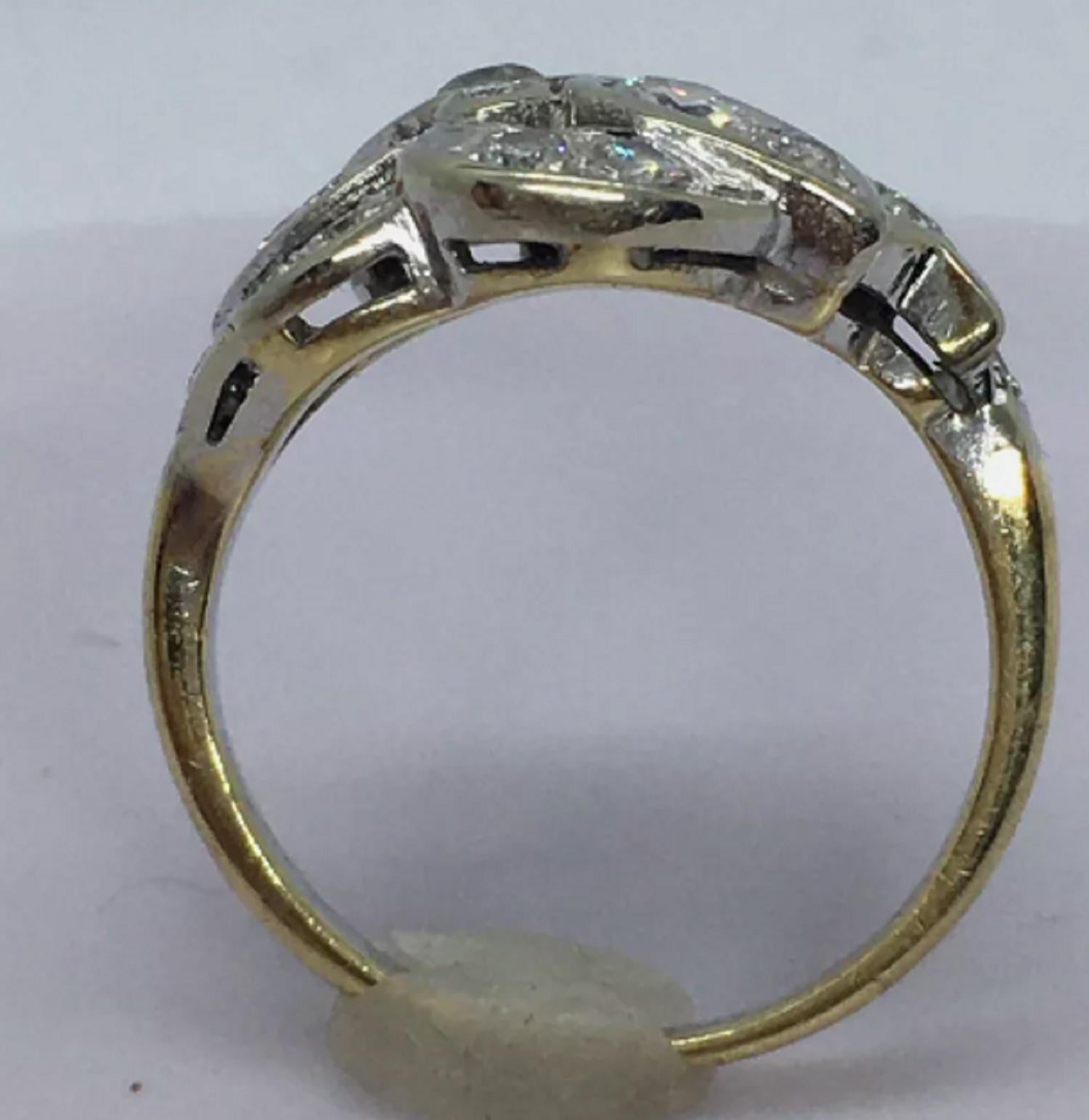 Antique 1920s Art Deco 14K gold 1/2 Carat Diamond American Filigree Ring 

weighting 3.8 gram
Size 5.25
one 3.2 mm, one 3.5 mm old cut plus 16 pieces single cut  translates to 1/2 Carat Diamond Total weight 
1/2 inch wide on top
Marked and tested