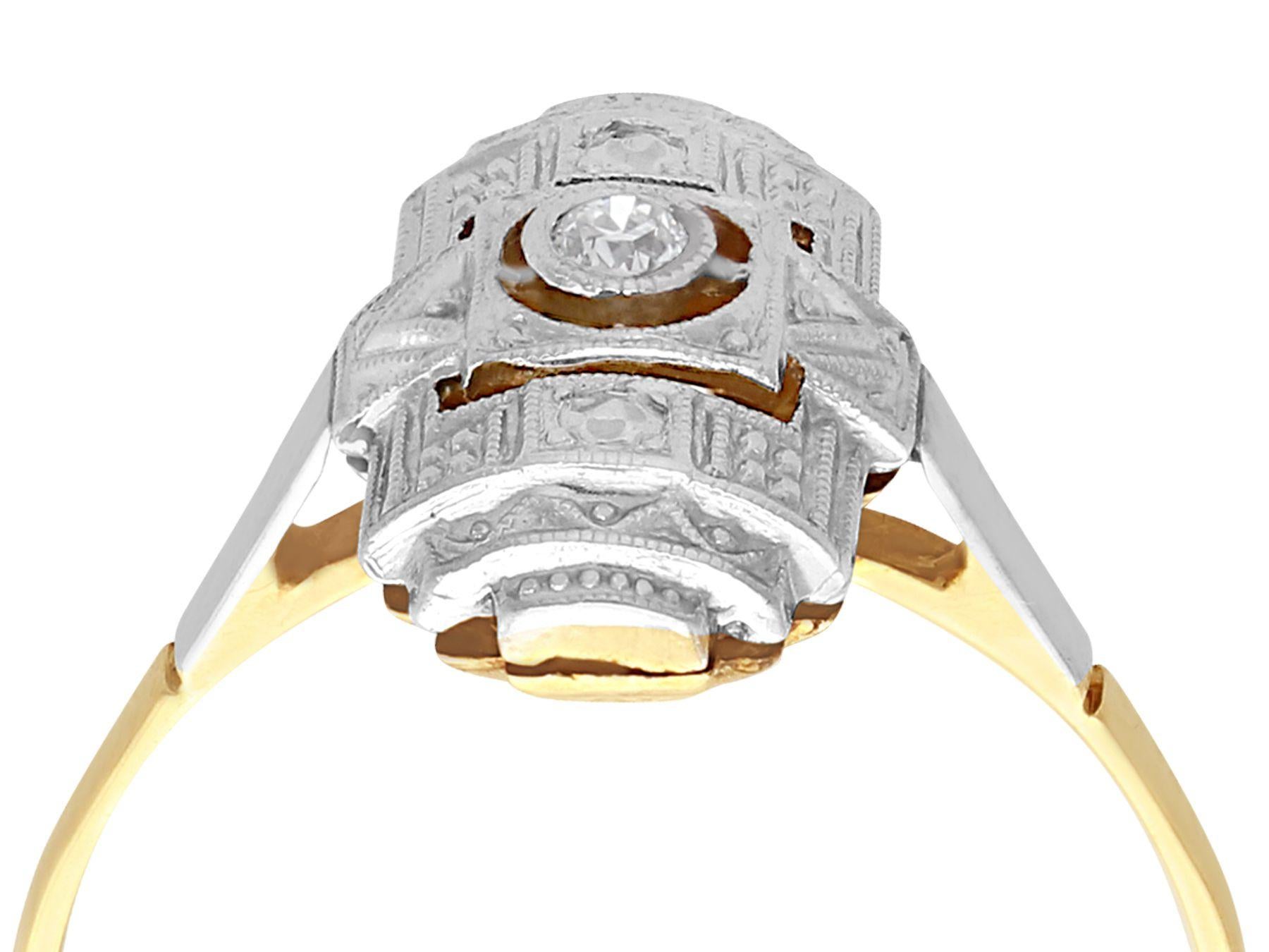 A fine and impressive Art Deco 0.03 carat diamond, 14 karat yellow gold and 14 karat white gold set cocktail ring; part of our diverse antique jewelry collections.

This fine and impressive cocktail ring has been crafted in 14k yellow gold with a