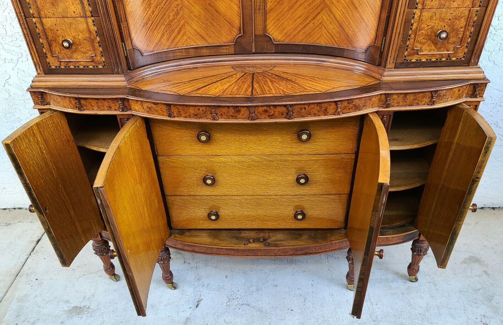 Offering one of our recent palm beach estate fine furniture acquisitions Of An 
Antique Art Nouveau Amboyna Burl Hand Carved Walnut Dresser

Approximate Measurements in Inches
53