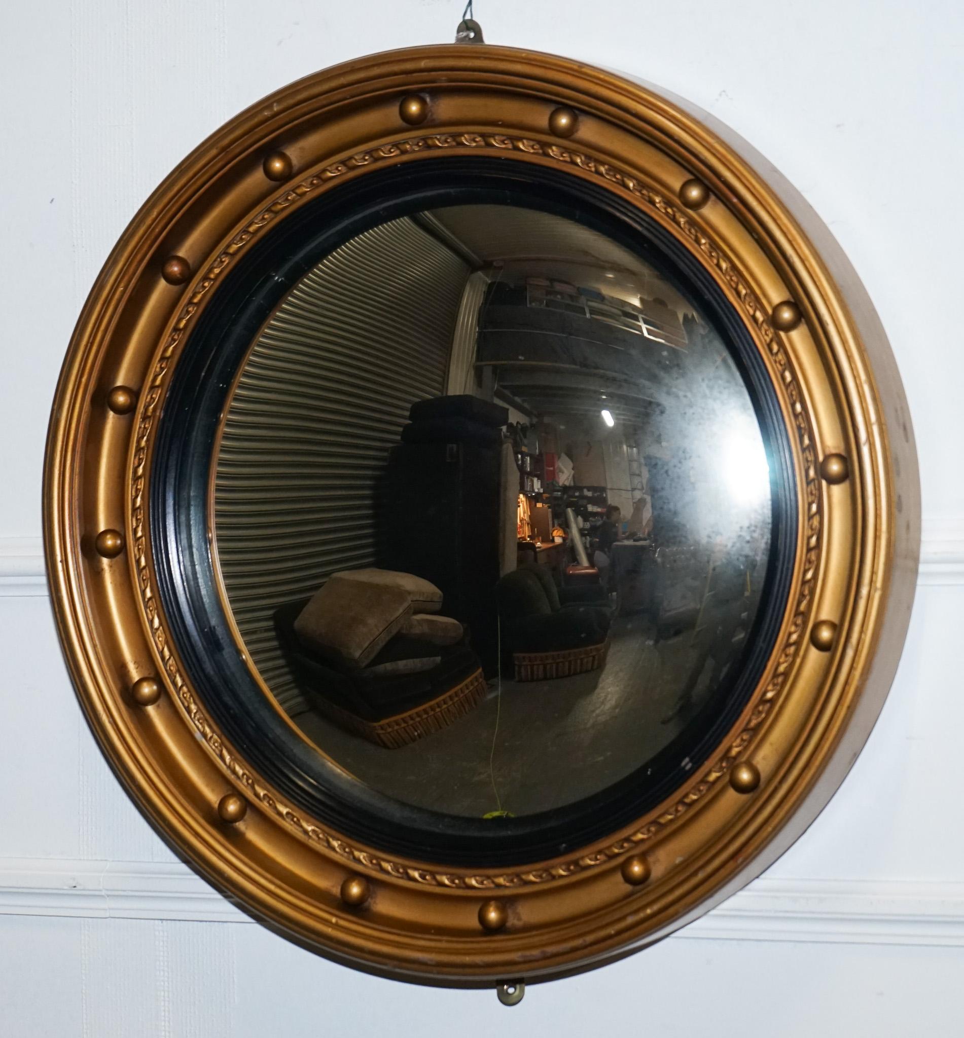 Hand-Crafted ANTIQUE 1920'S BUTLERS CONVEX BLACK & GOLD GILT WOOD WALL MiRROR For Sale